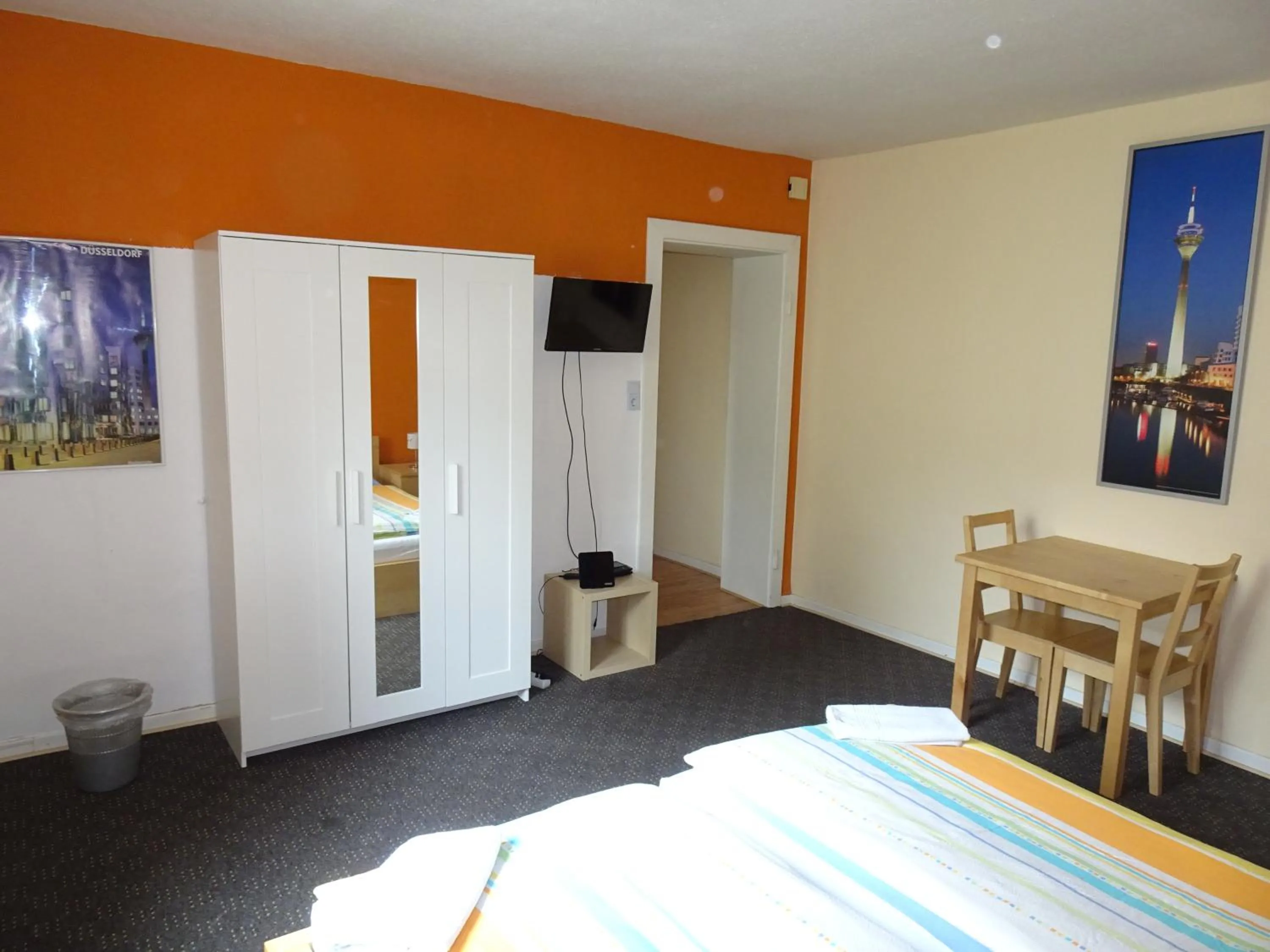 Photo of the whole room, Bed in Gästehaus Grupello