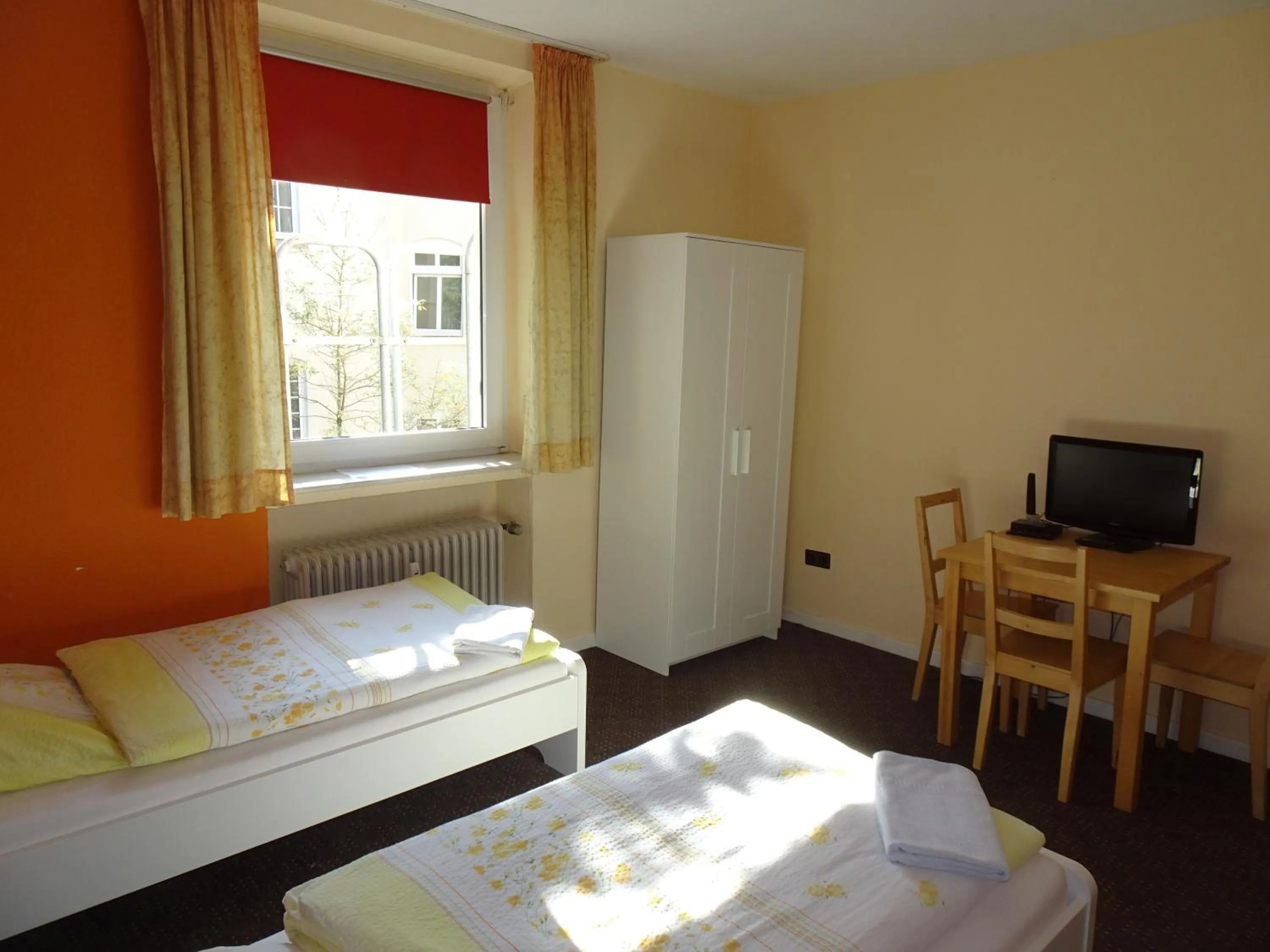 Photo of the whole room, Bed in Gästehaus Grupello