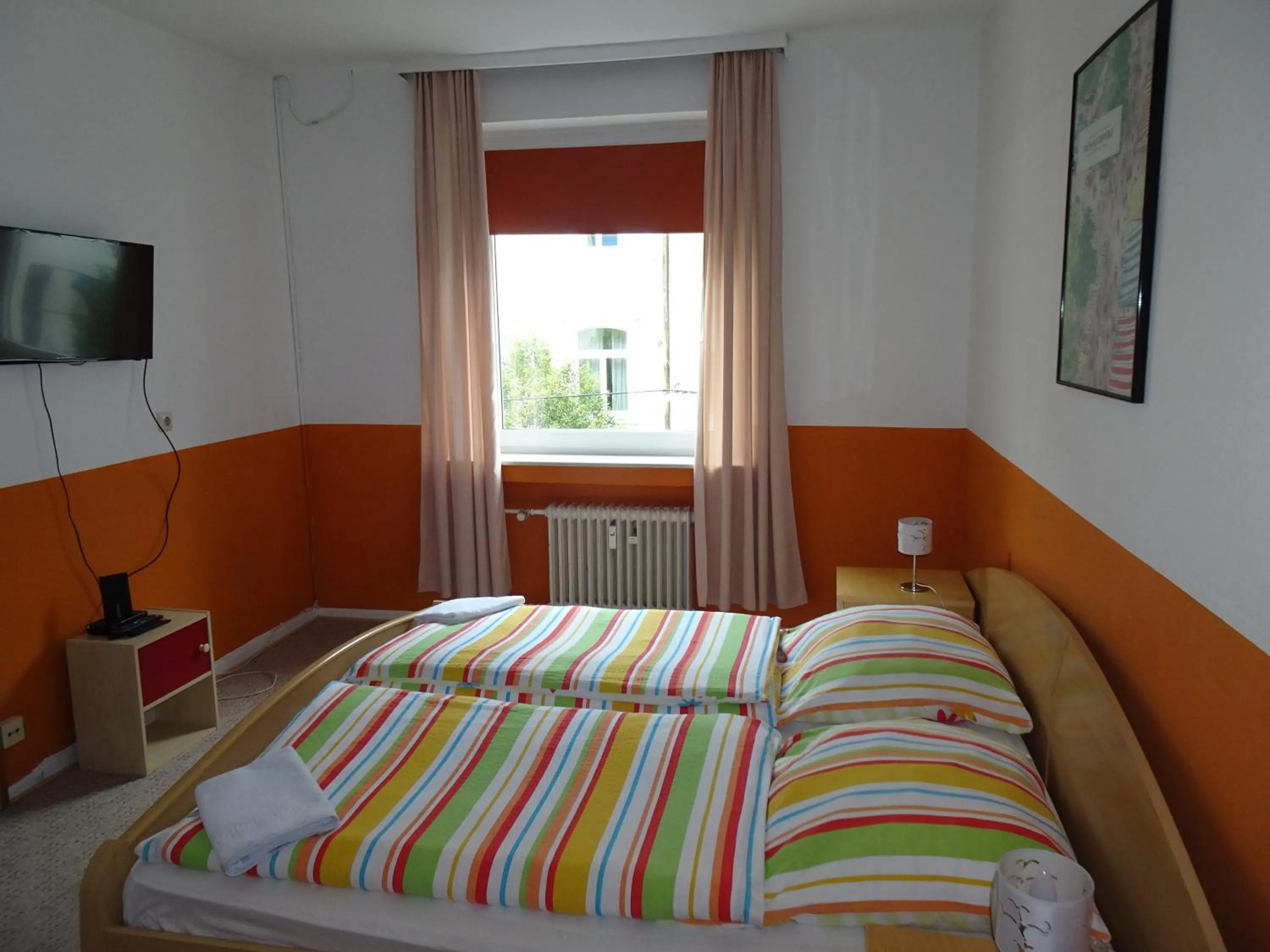 Photo of the whole room, Bed in Gästehaus Grupello