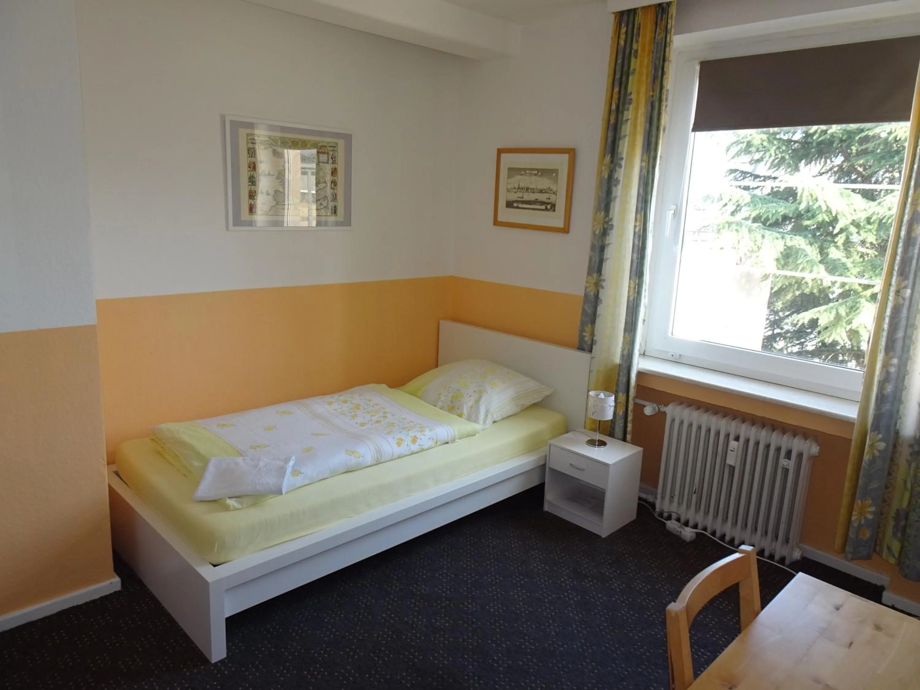 Photo of the whole room, Bed in Gästehaus Grupello