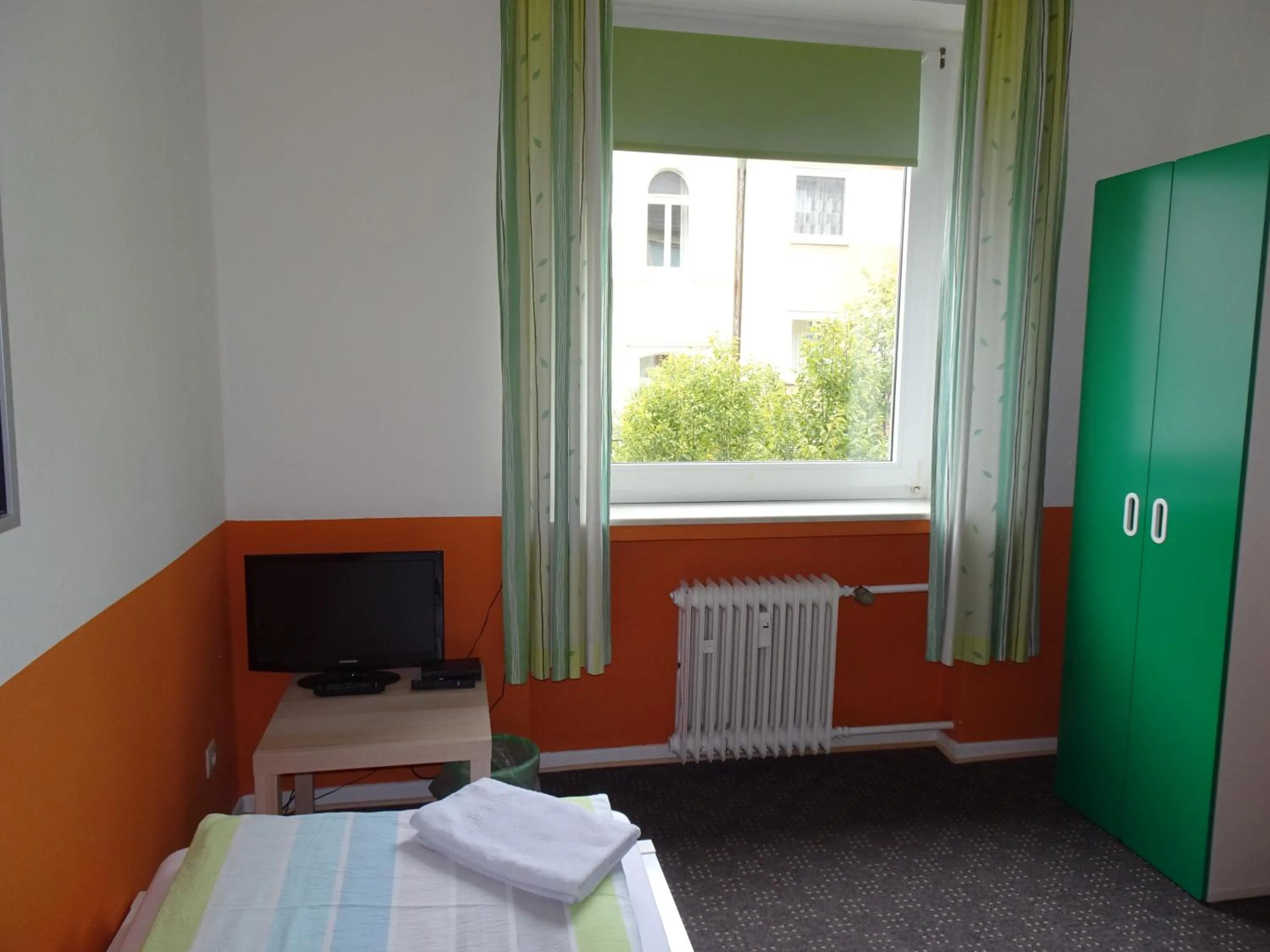 Photo of the whole room, Bed in Gästehaus Grupello