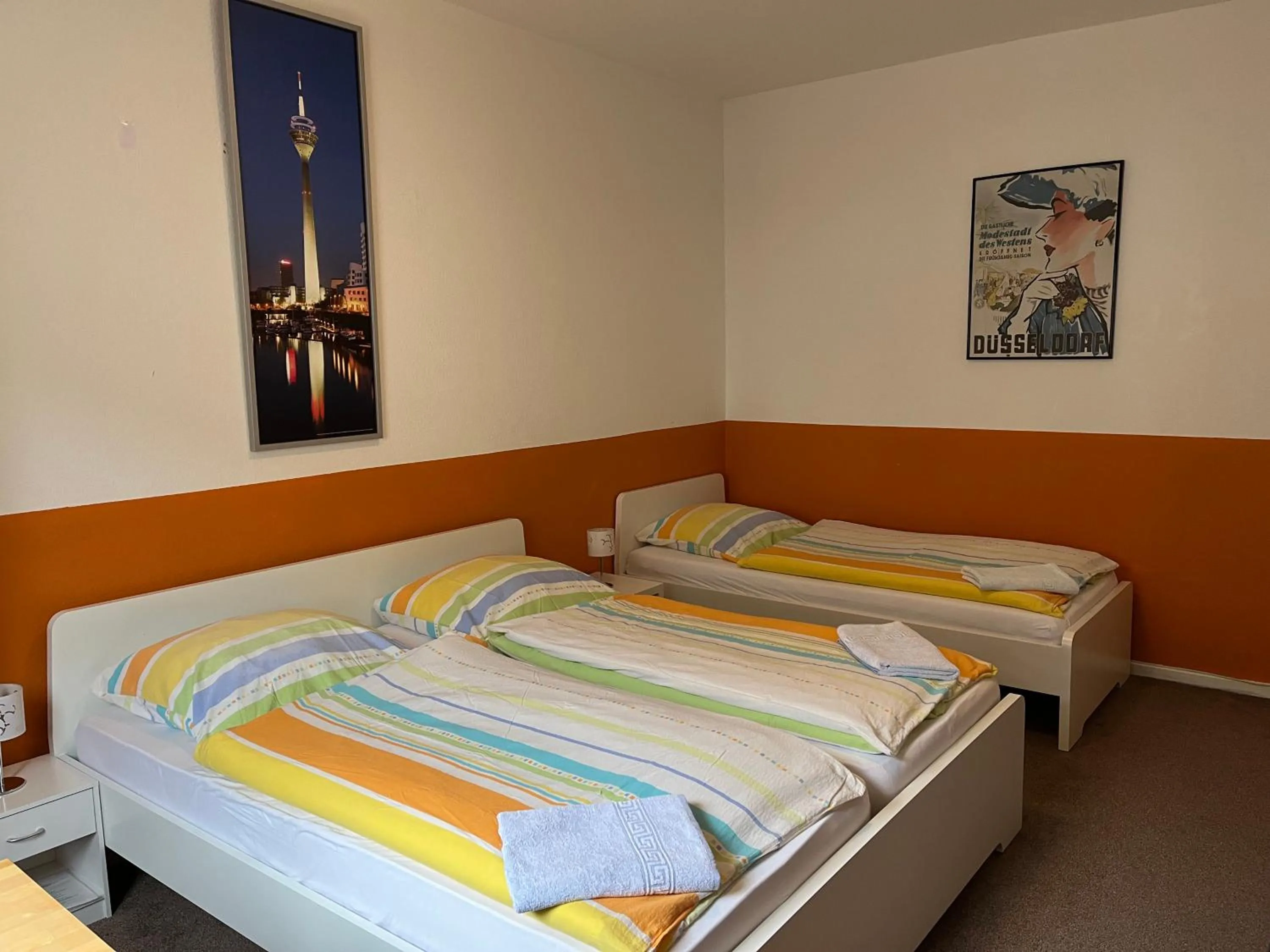 Photo of the whole room, Bed in Gästehaus Grupello