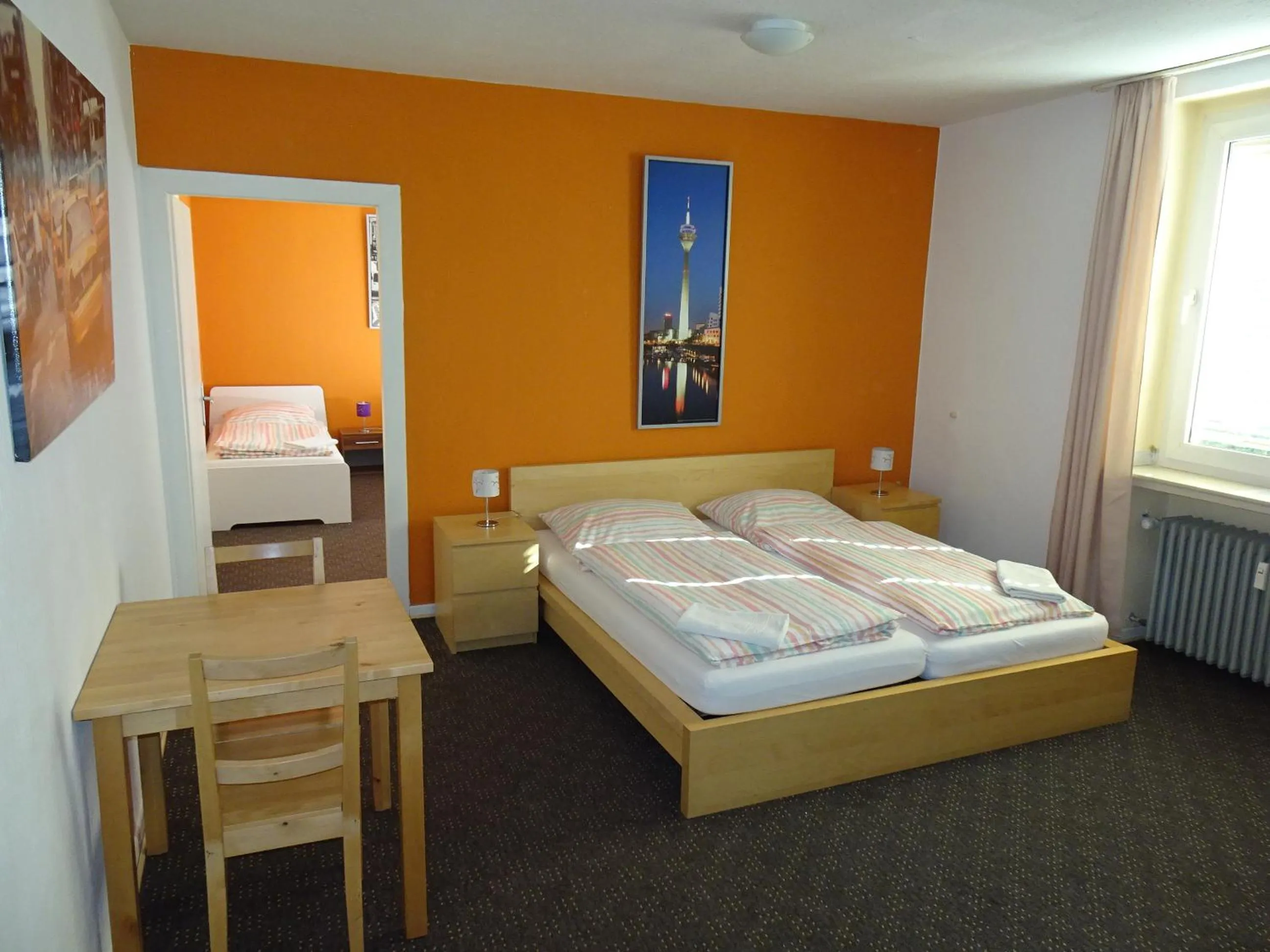 Photo of the whole room, Bed in Gästehaus Grupello