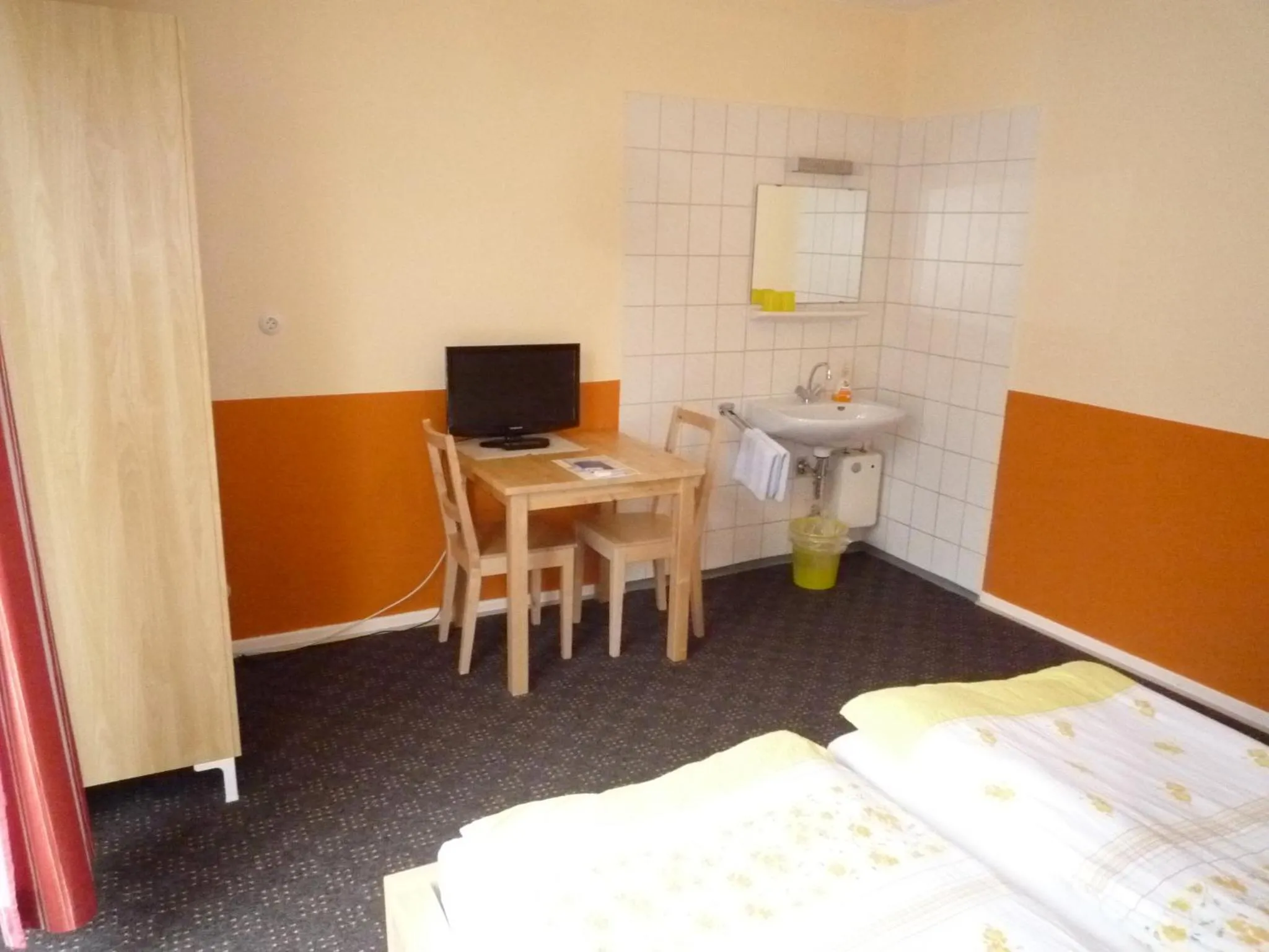 Photo of the whole room, Bed in Gästehaus Grupello