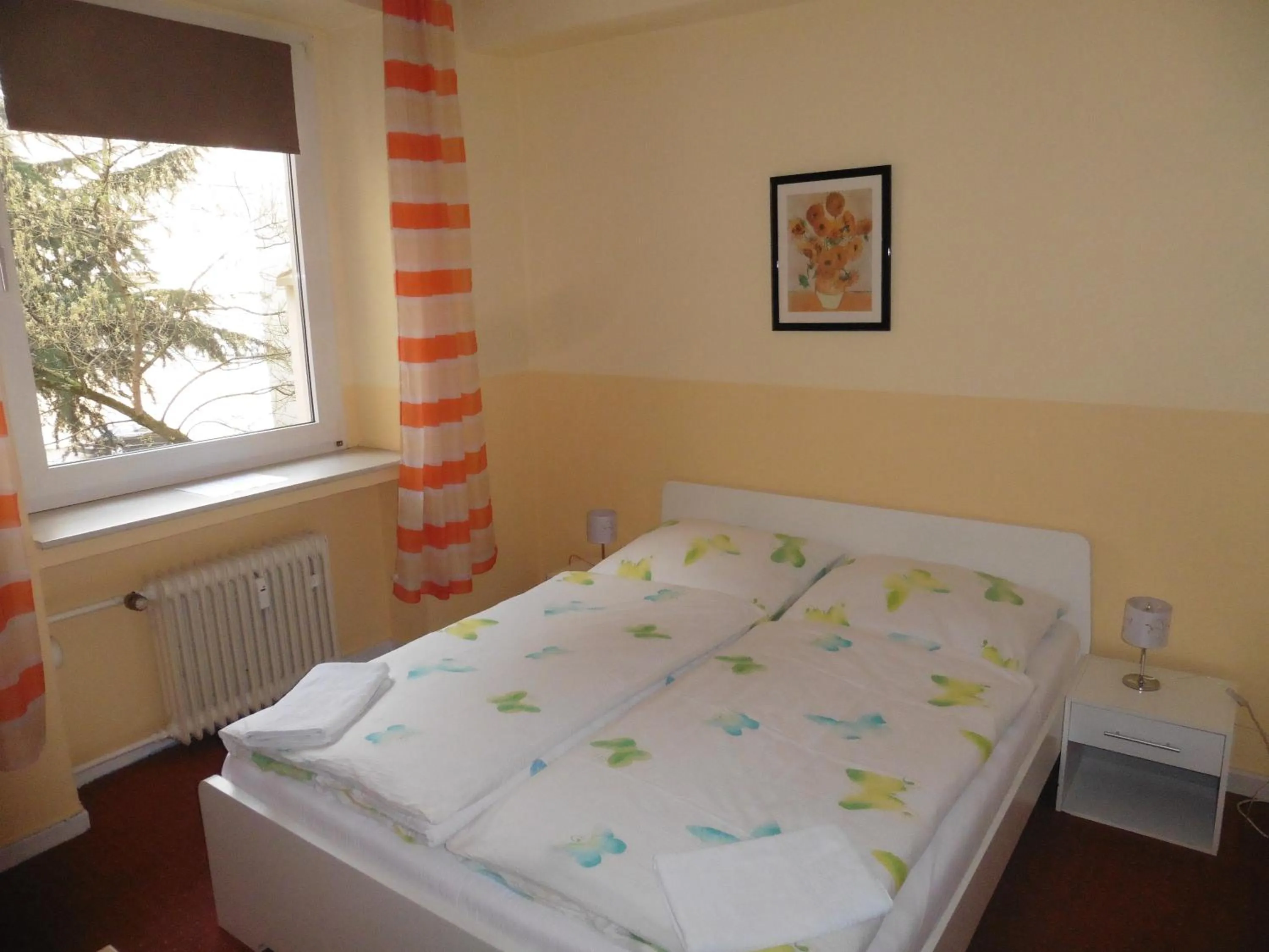 Photo of the whole room, Bed in Gästehaus Grupello