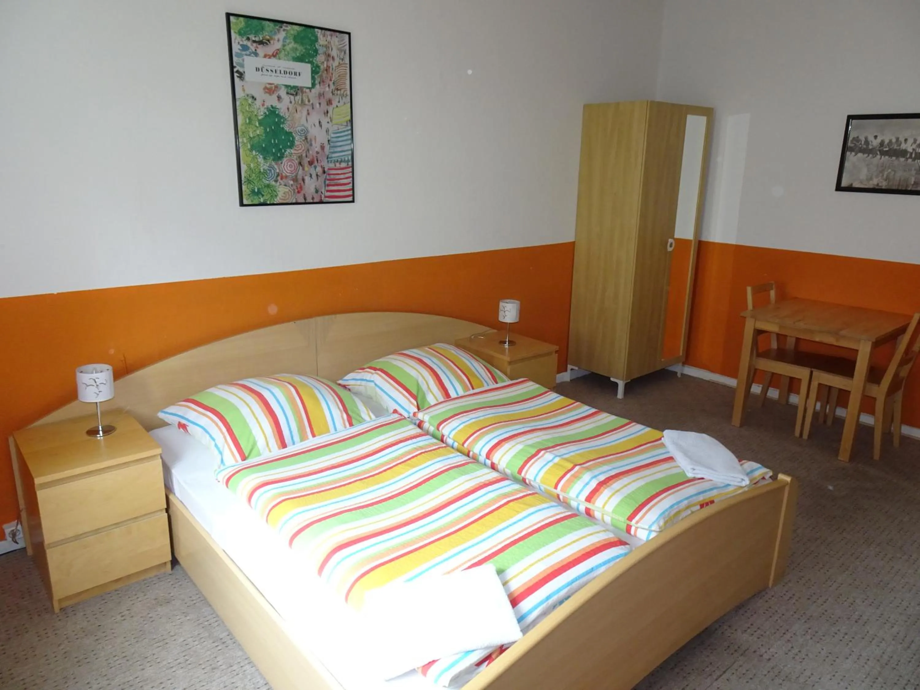 Photo of the whole room, Bed in Gästehaus Grupello