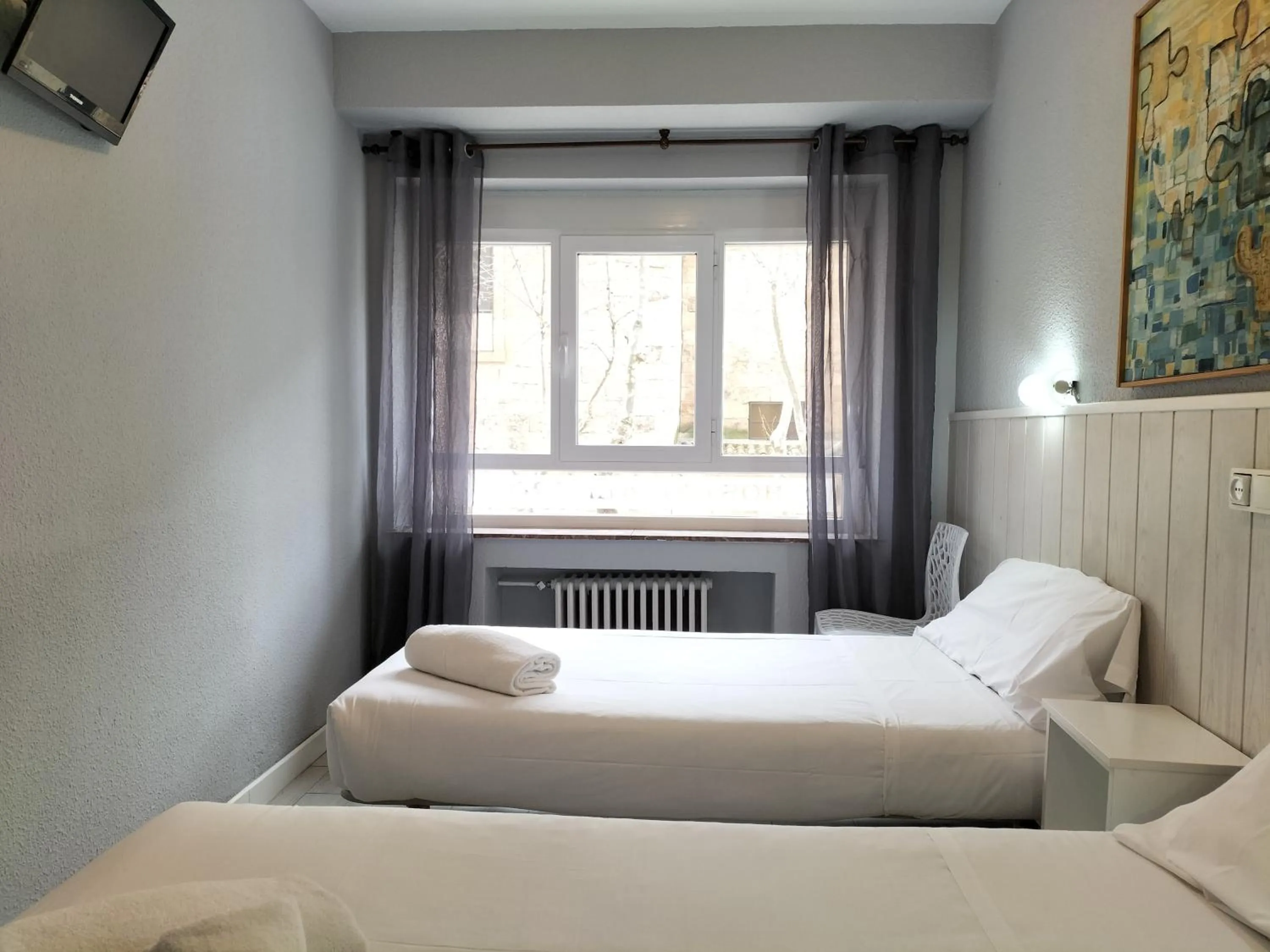 Bed in Hostal Albero by gaiarooms