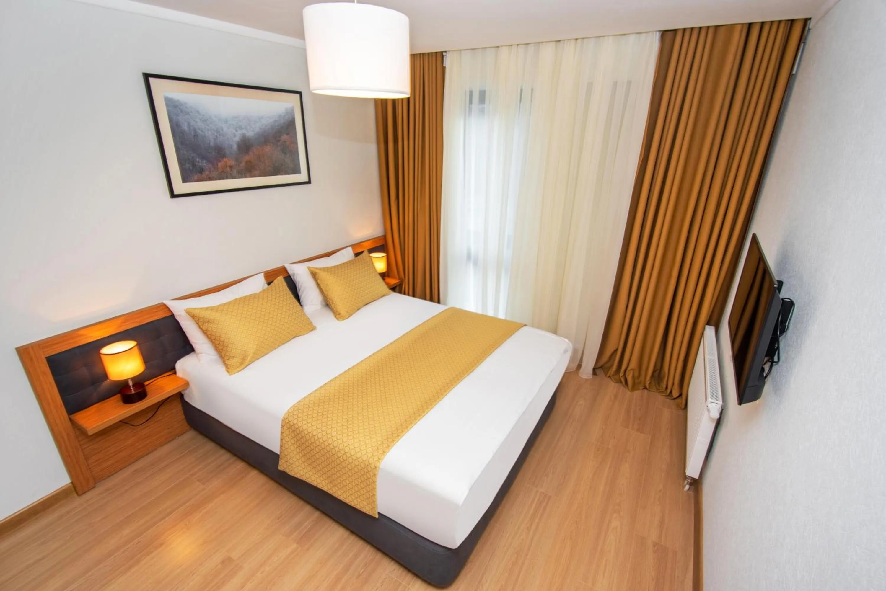Bed in Orbi Palace Hotel Official
