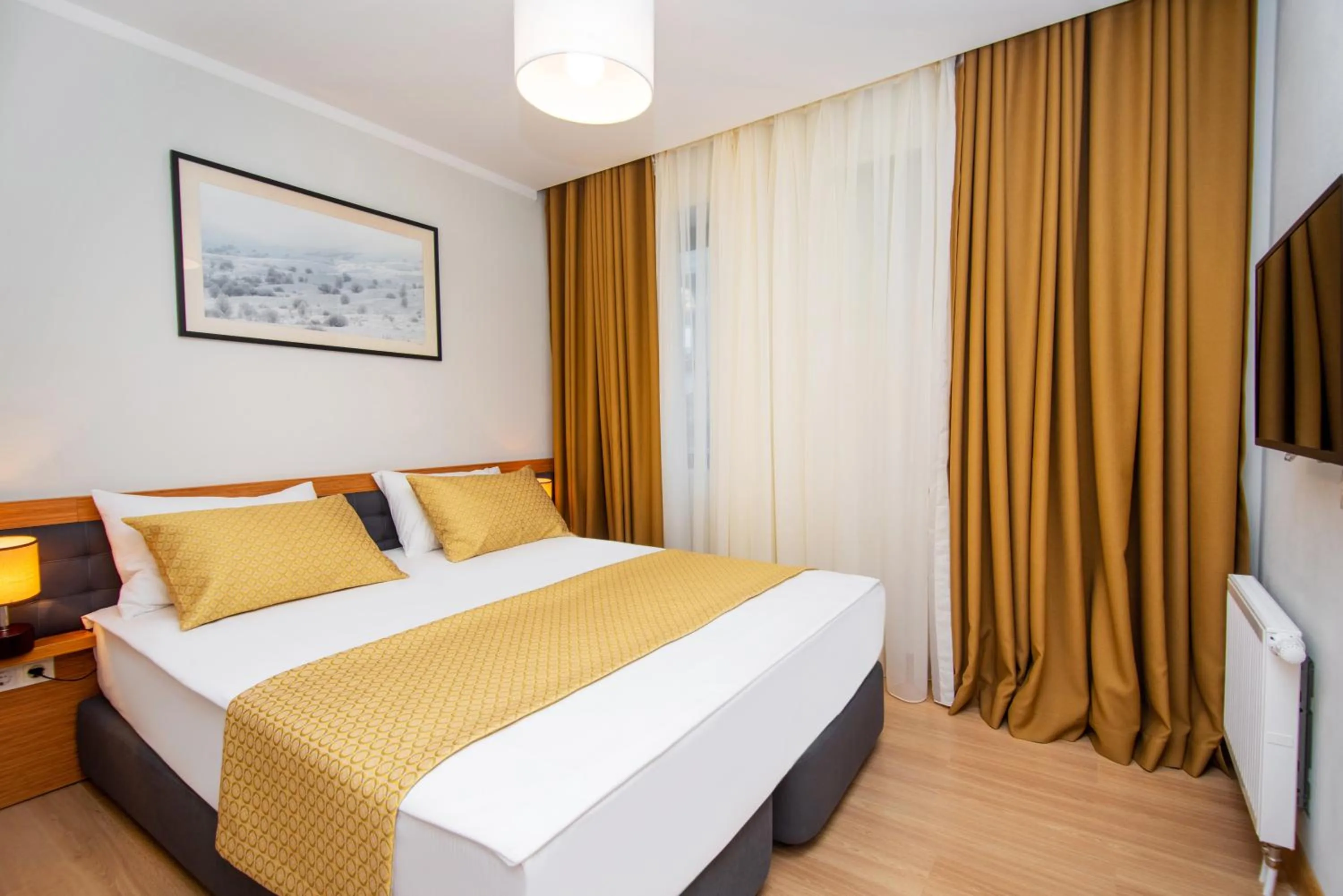 Bed in Orbi Palace Hotel Official