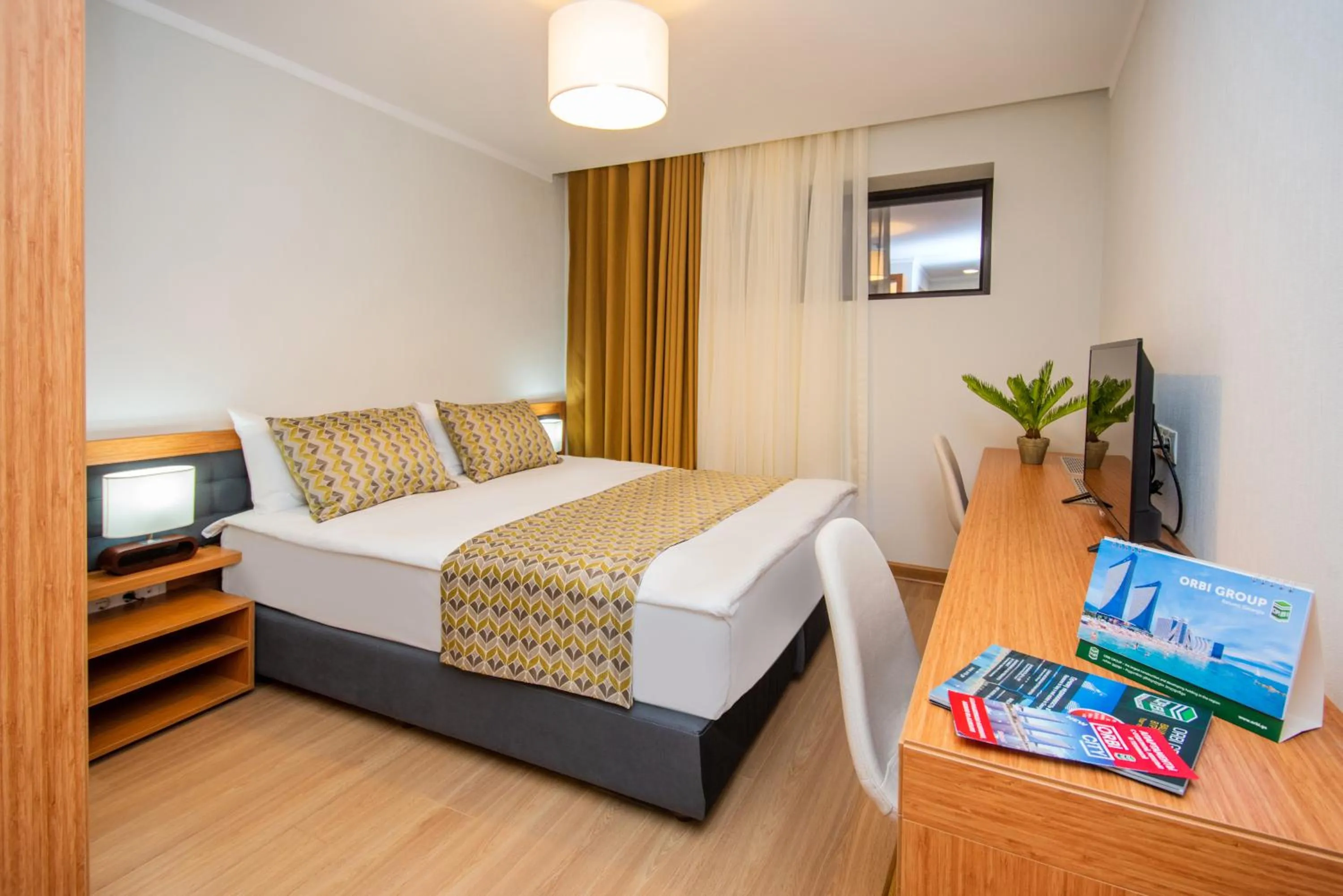 Photo of the whole room, Bed in Orbi Palace Hotel Official