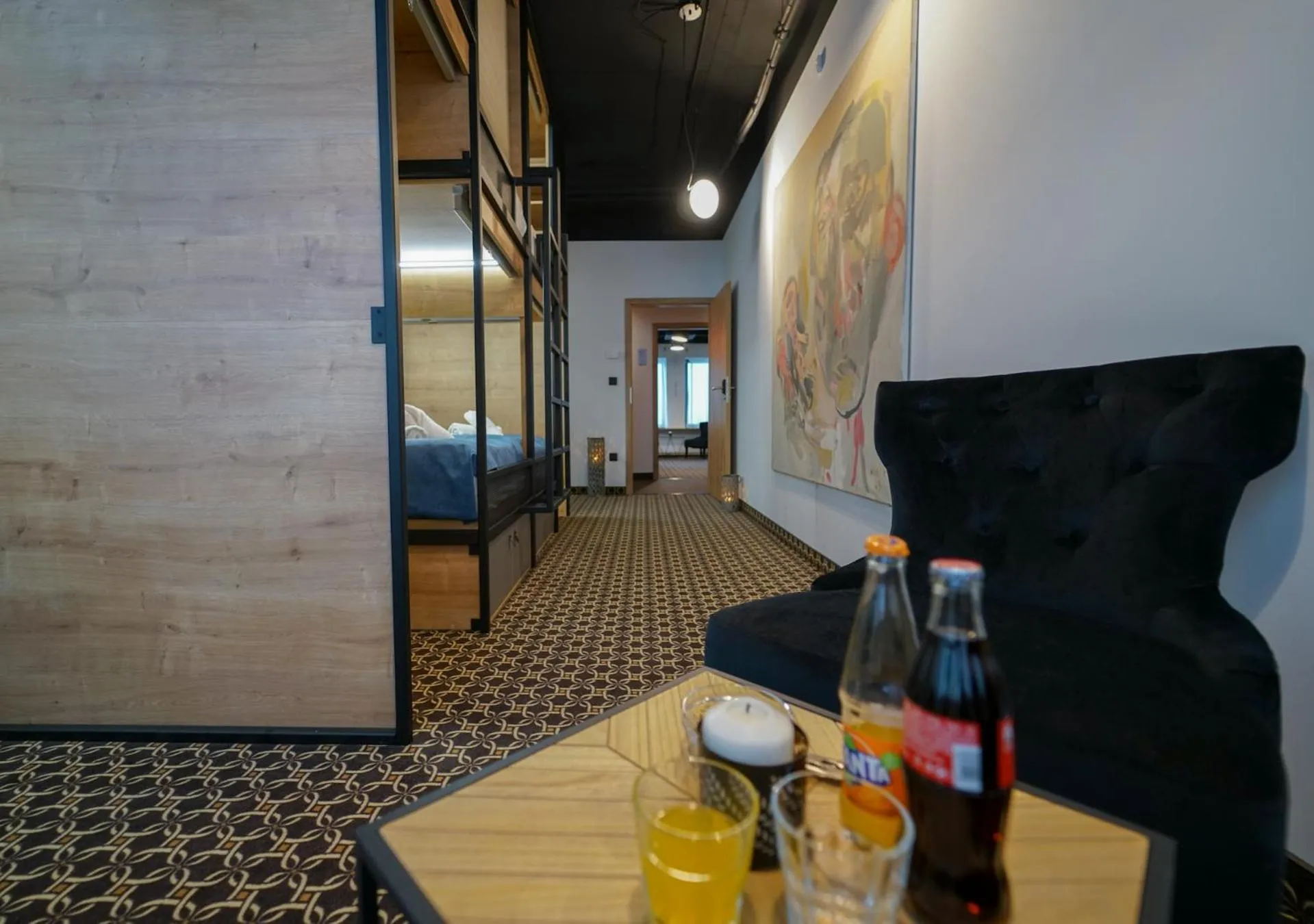 Seating area in CHORS like a hotel - Capsule & NFT Boutique Hostel Bratislava - City Center