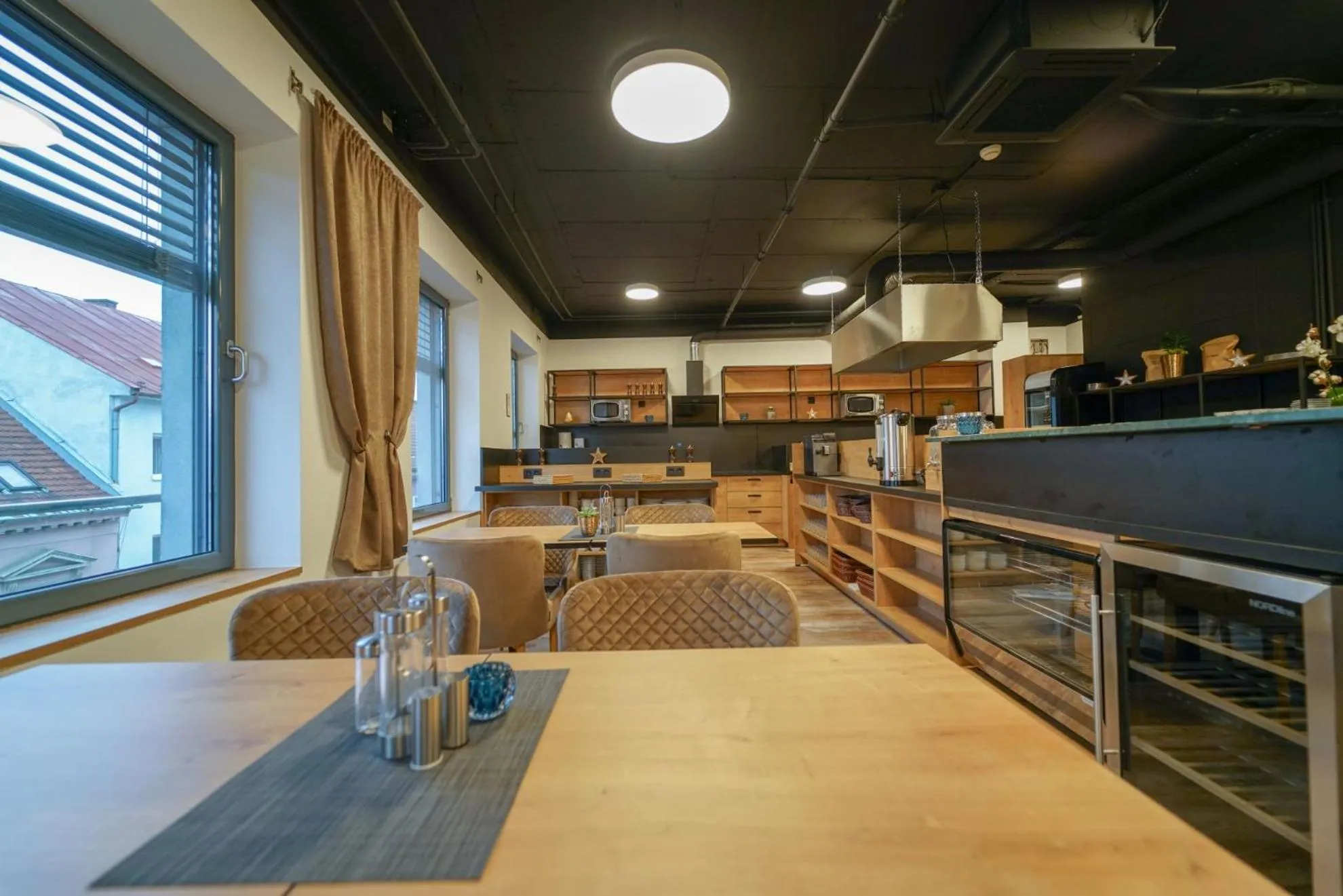 Kitchen or kitchenette in CHORS like a hotel - Capsule & NFT Boutique Hostel Bratislava - City Center