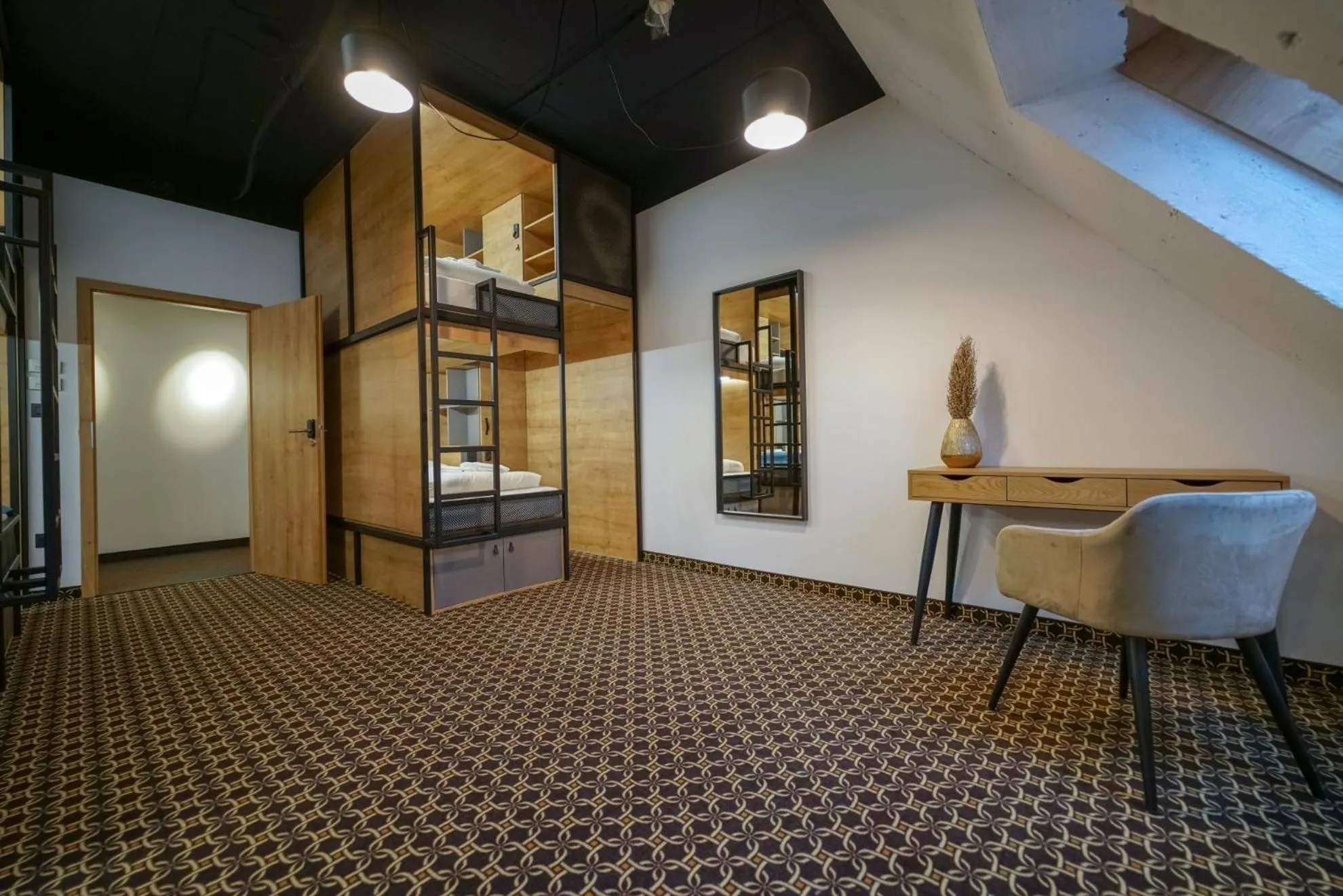 Living room in CHORS like a hotel - Capsule & NFT Boutique Hostel Bratislava - City Center