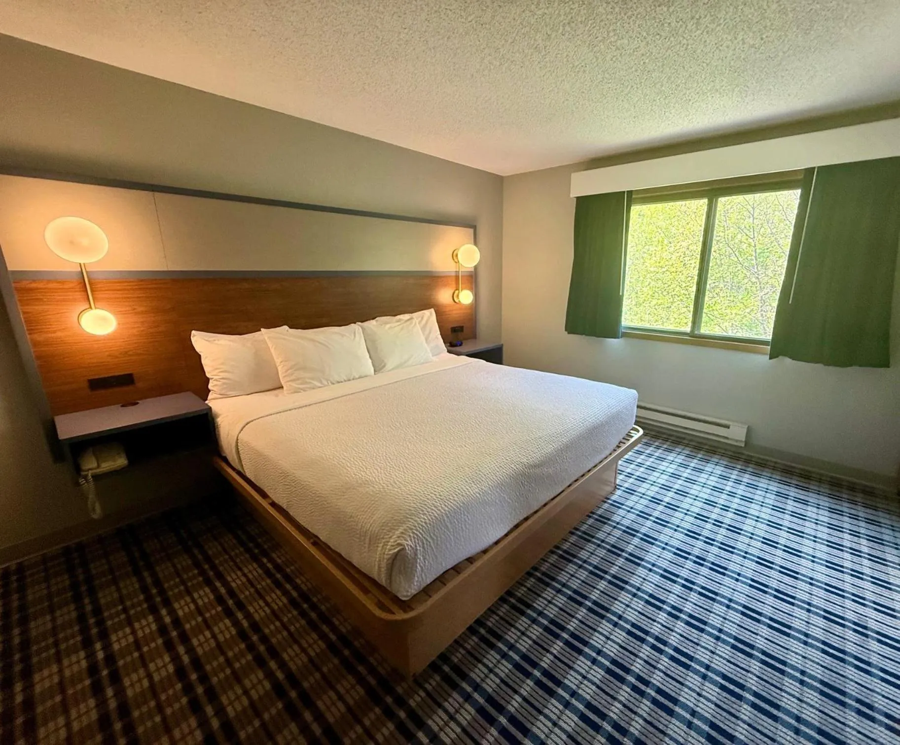 Bed in AmericInn by Wyndham Tofte Near Lake Superior
