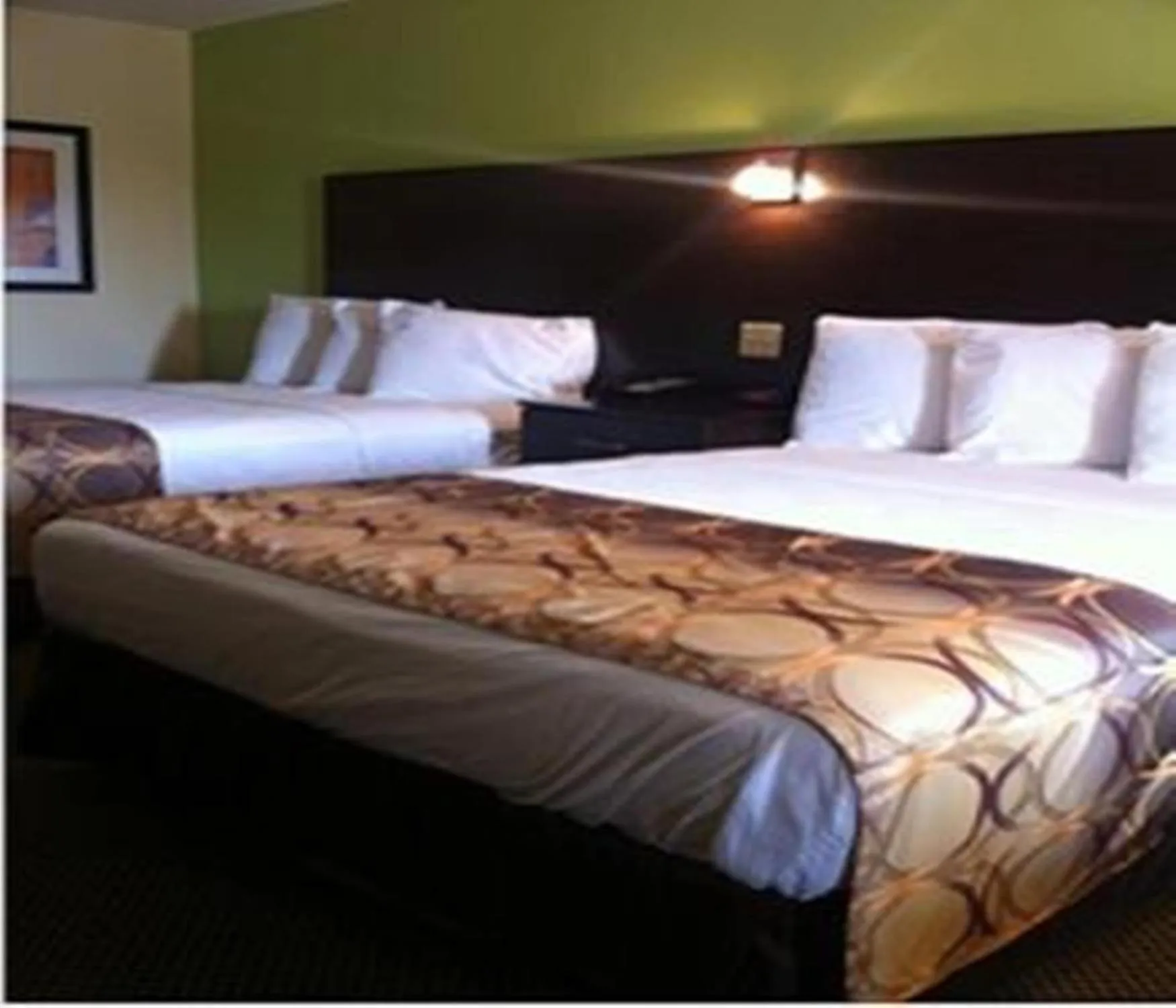 Bed in Americas Best Value Inn Lake Charles Interstate 210