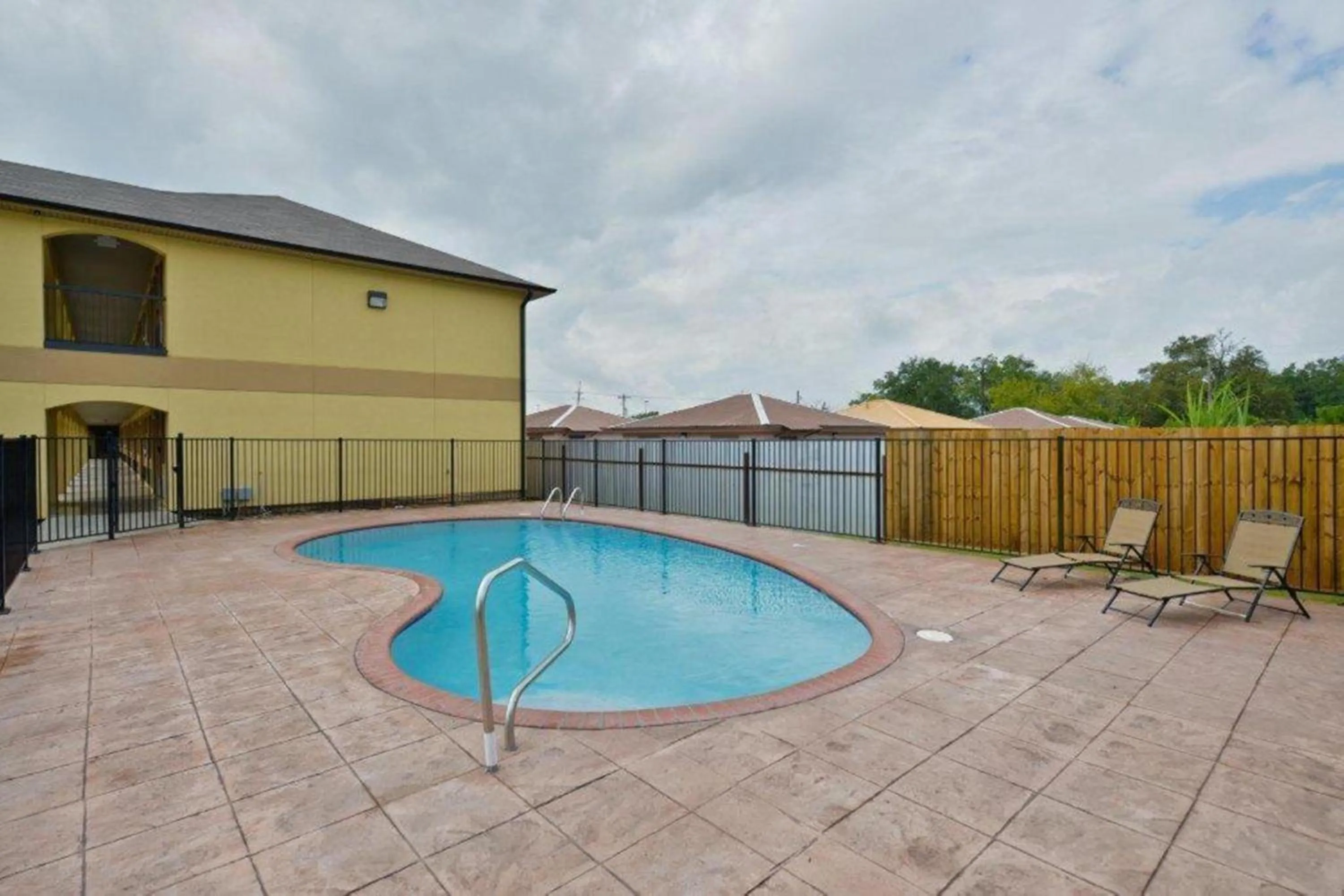 Swimming pool in Americas Best Value Inn Lake Charles Interstate 210
