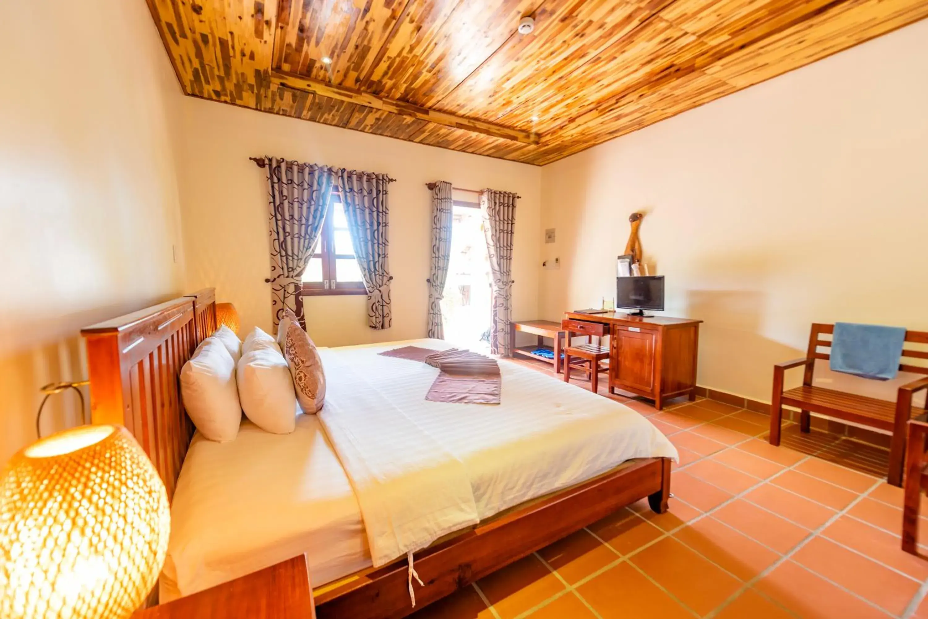 Deluxe Double Room with Partial Sea View in Phu Quoc Eco Beach Resort Deluxe Double Room with Partial Sea View in Phu Quoc Eco Beach Resort