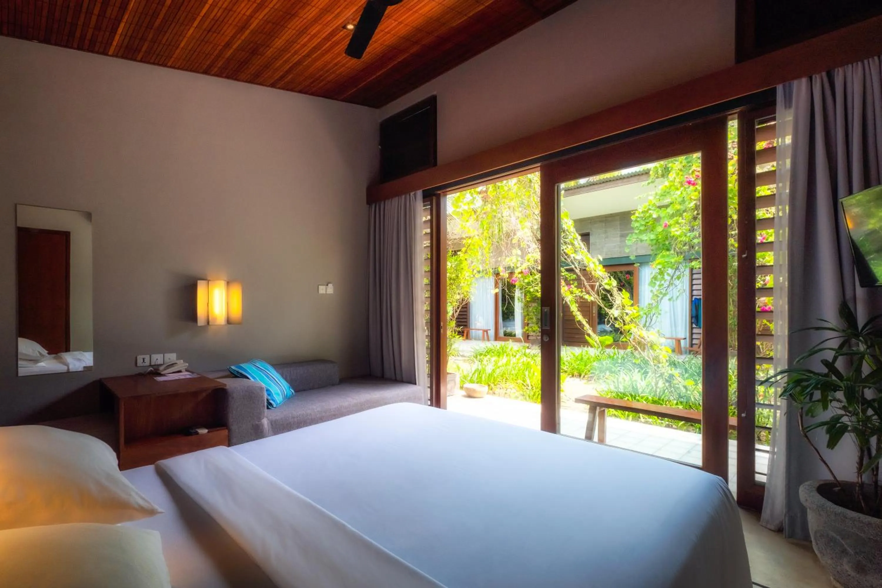 Property building, Bed in Hotel Komune and Beach Club Bali