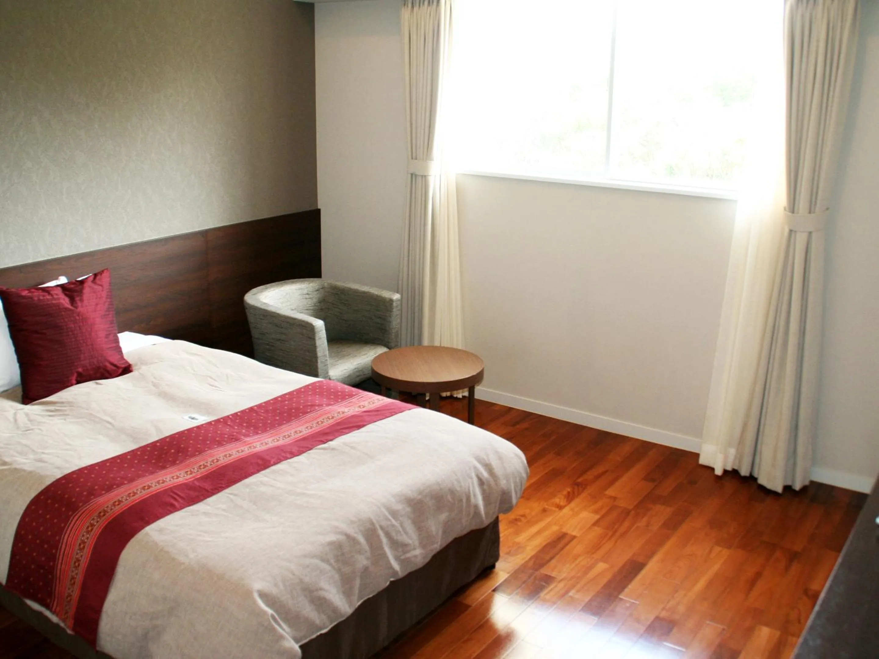 Bedroom, Bed in Hotel Hamahigashima Resort