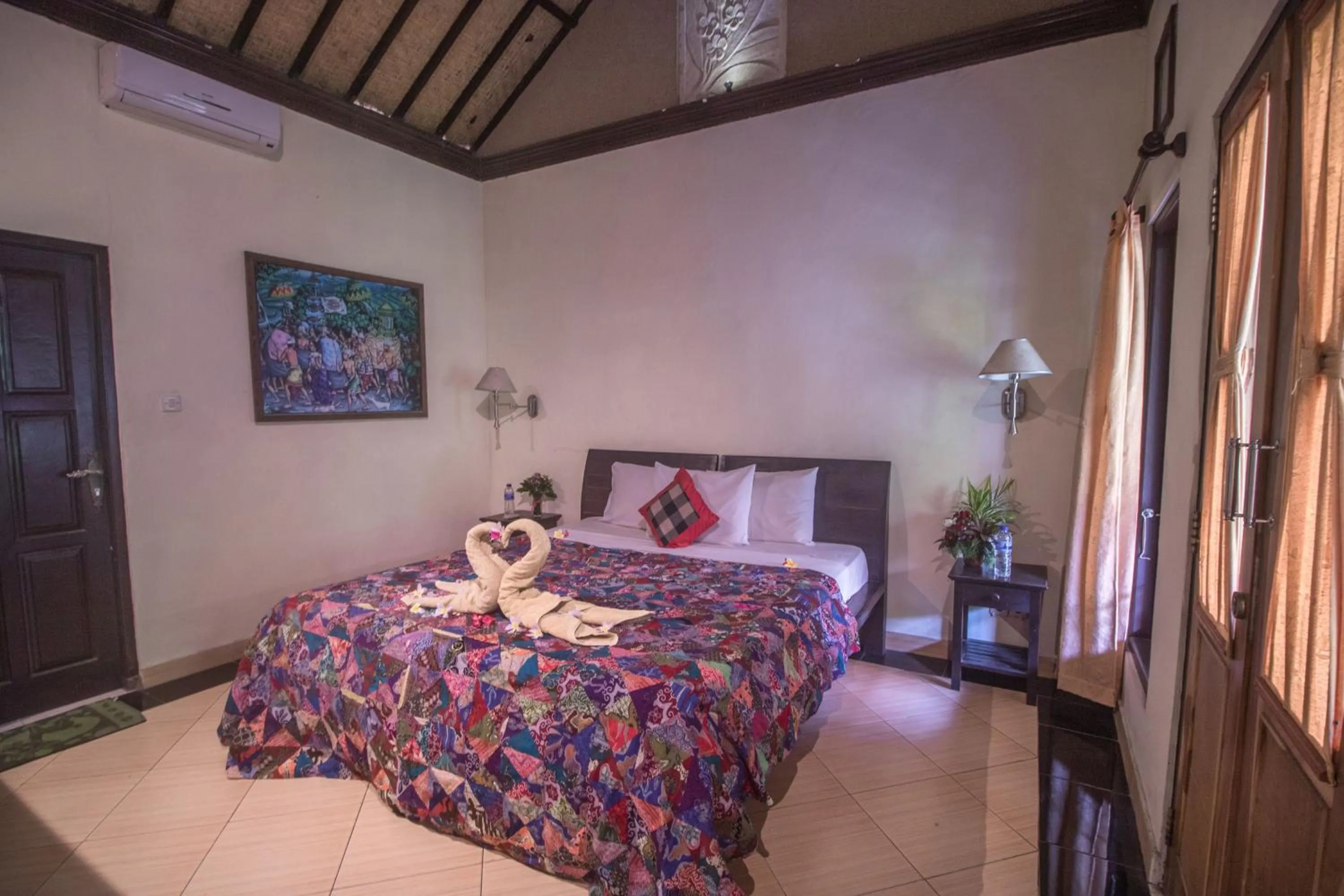 Bed in Trijaya Guest House Pemuteran