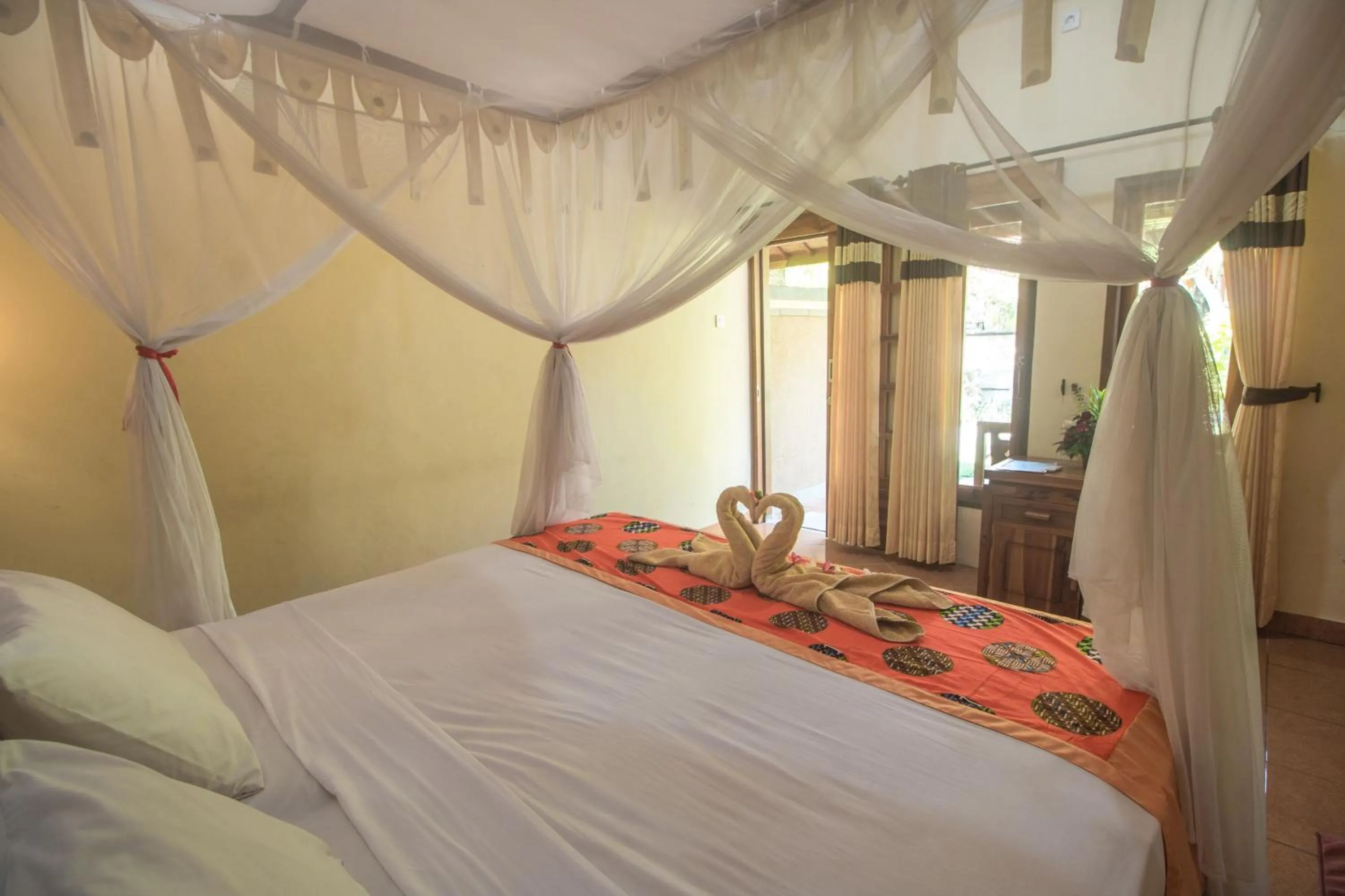 Bed in Trijaya Guest House Pemuteran