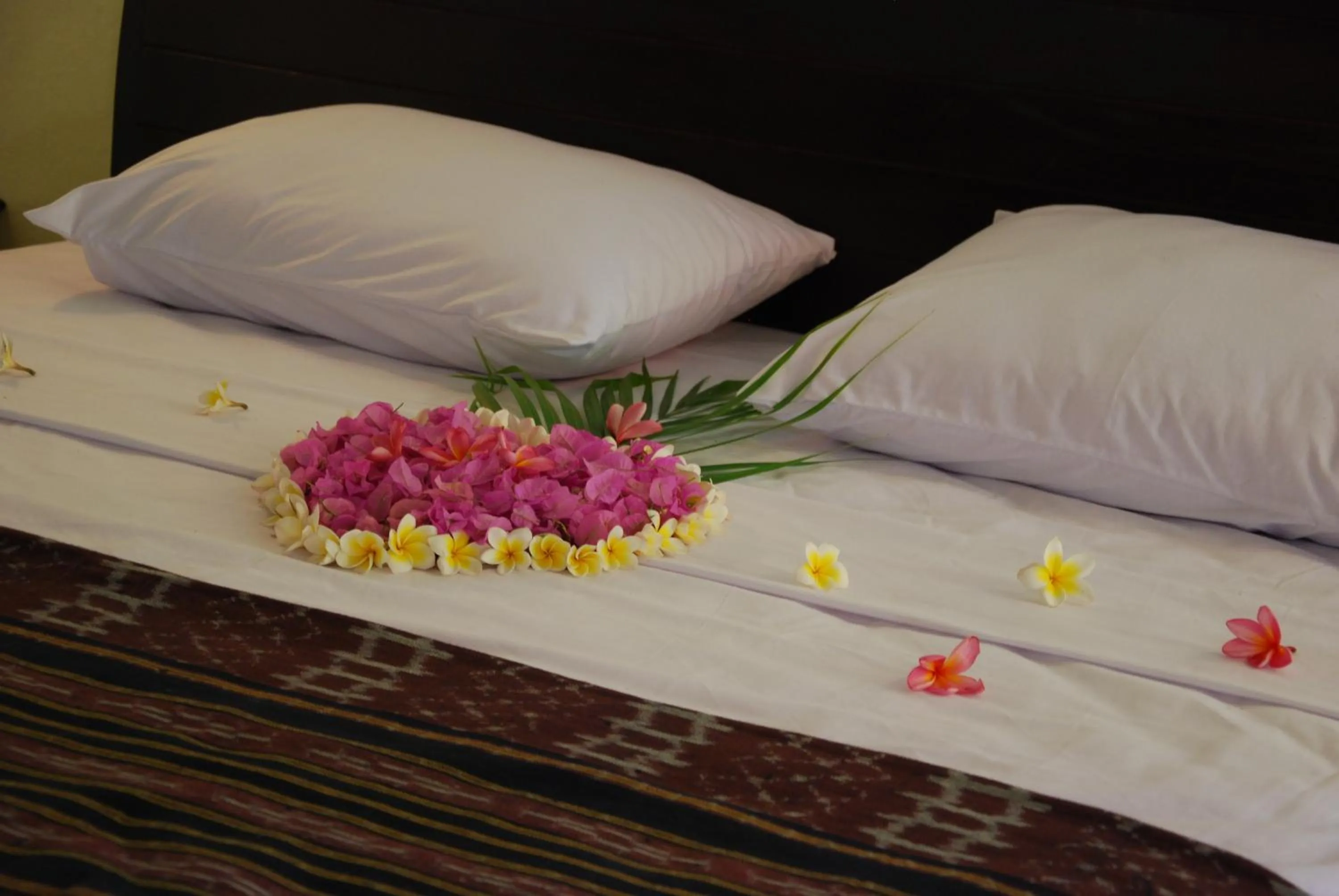 Bed in Trijaya Guest House Pemuteran