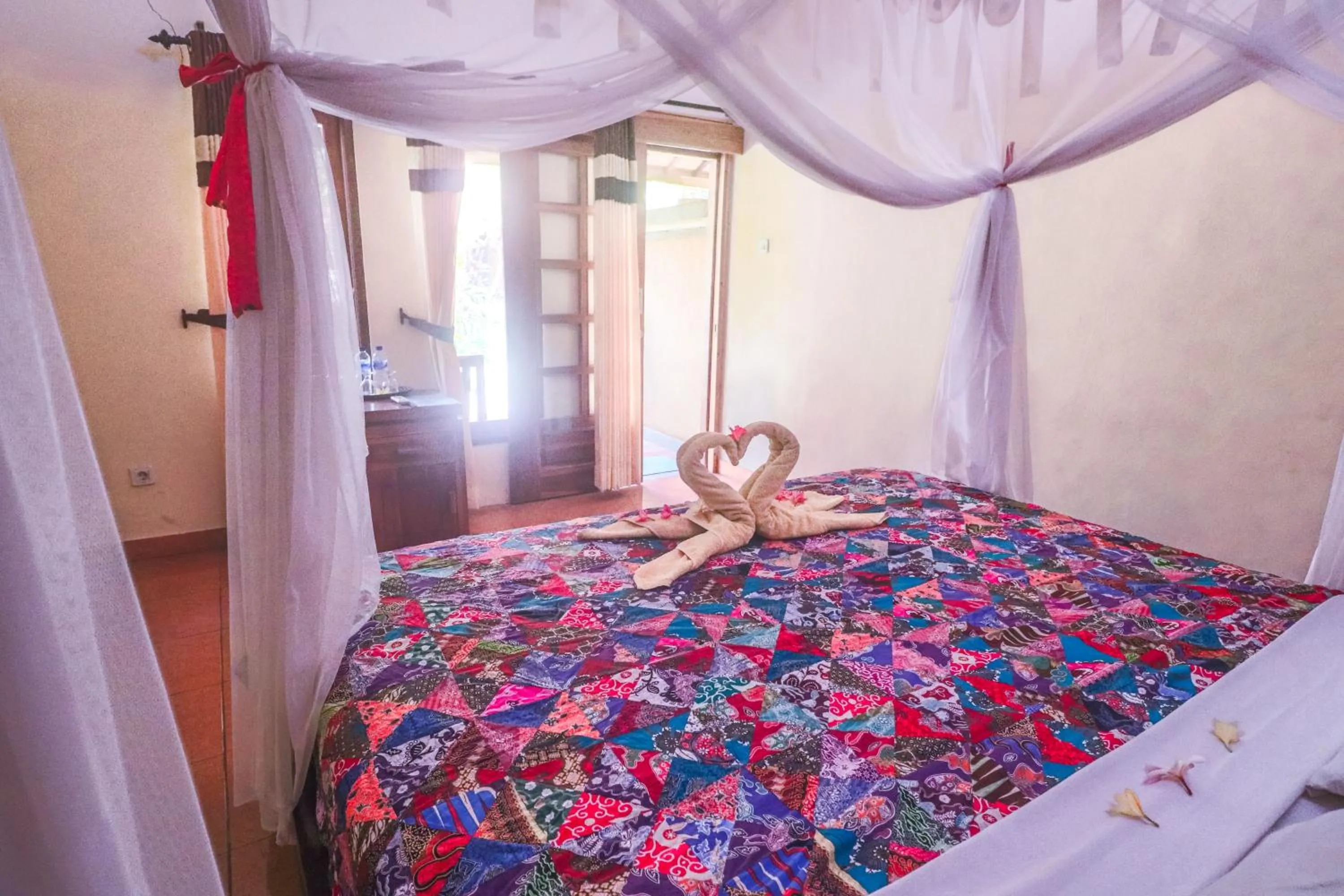 Bed in Trijaya Guest House Pemuteran