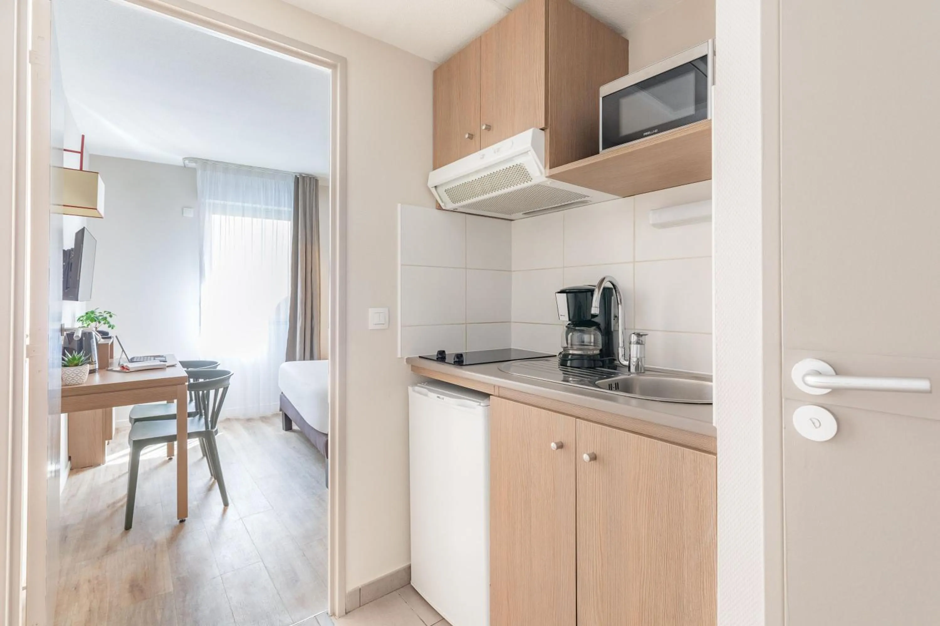 Kitchen or kitchenette in Appart'City Classic Valence