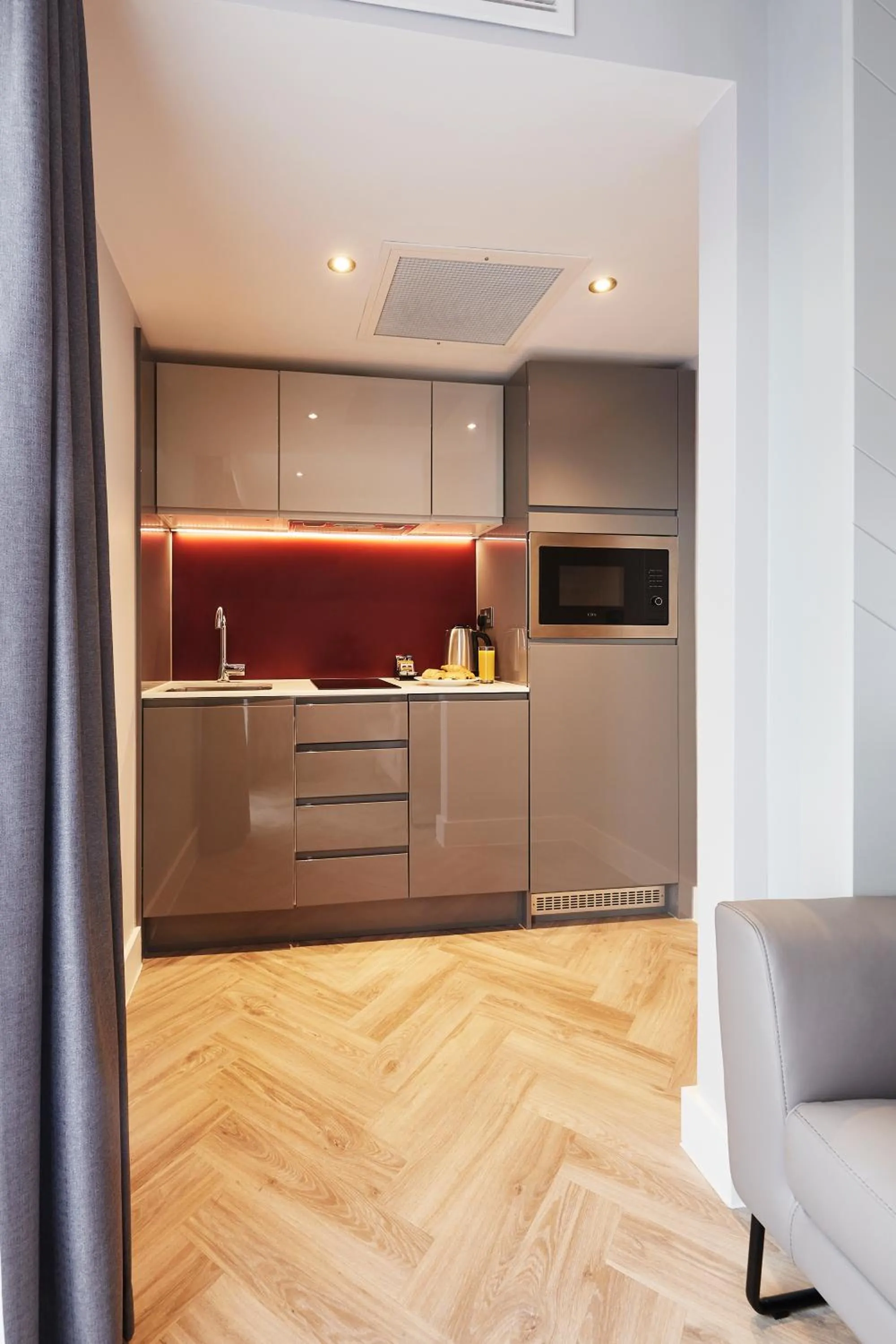 Kitchen or kitchenette in Roomzzz Newcastle City
