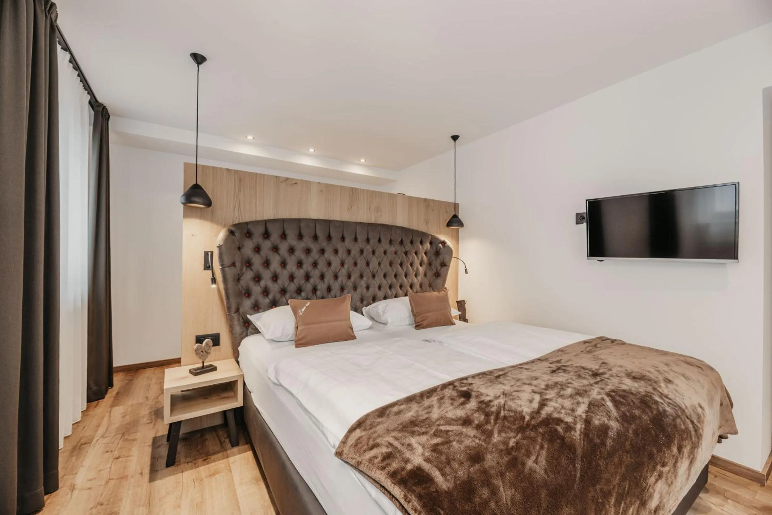 Bed in Freina Mountain Lifestyle Hotel