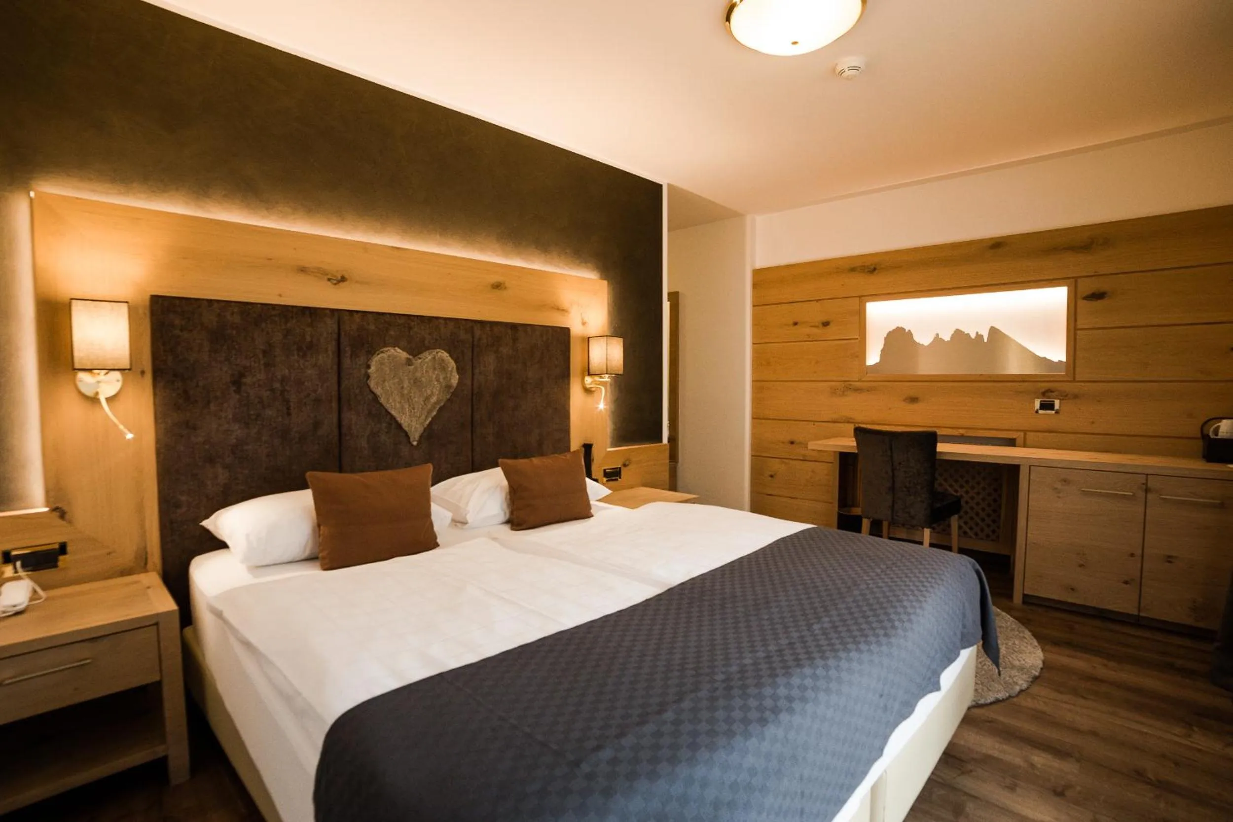 Bed in Freina Mountain Lifestyle Hotel