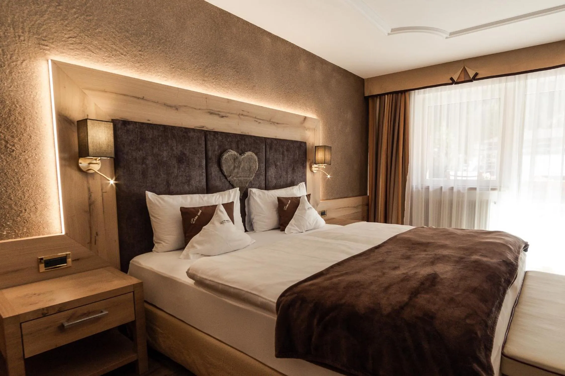 Bed in Freina Mountain Lifestyle Hotel