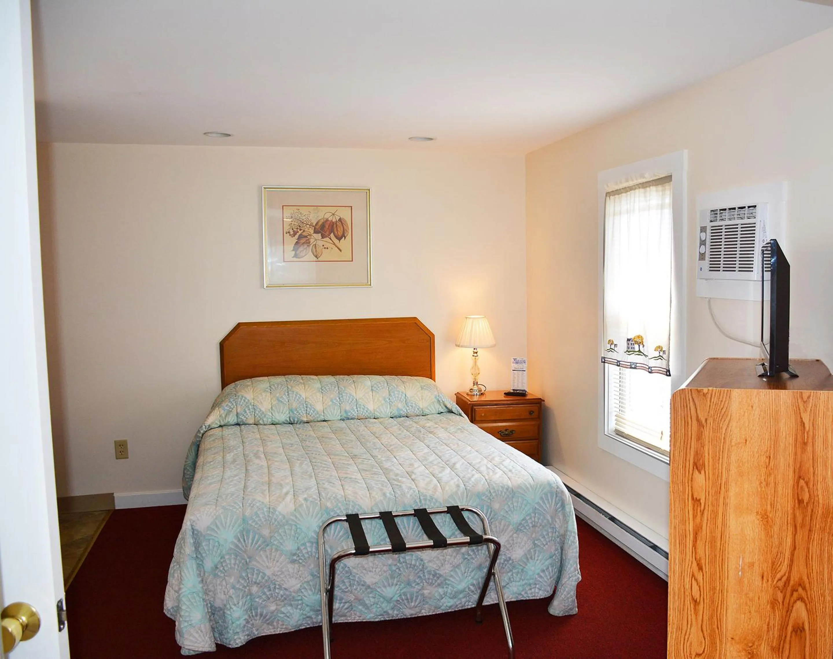 Bed in Alouette Beach Resort Economy Rooms