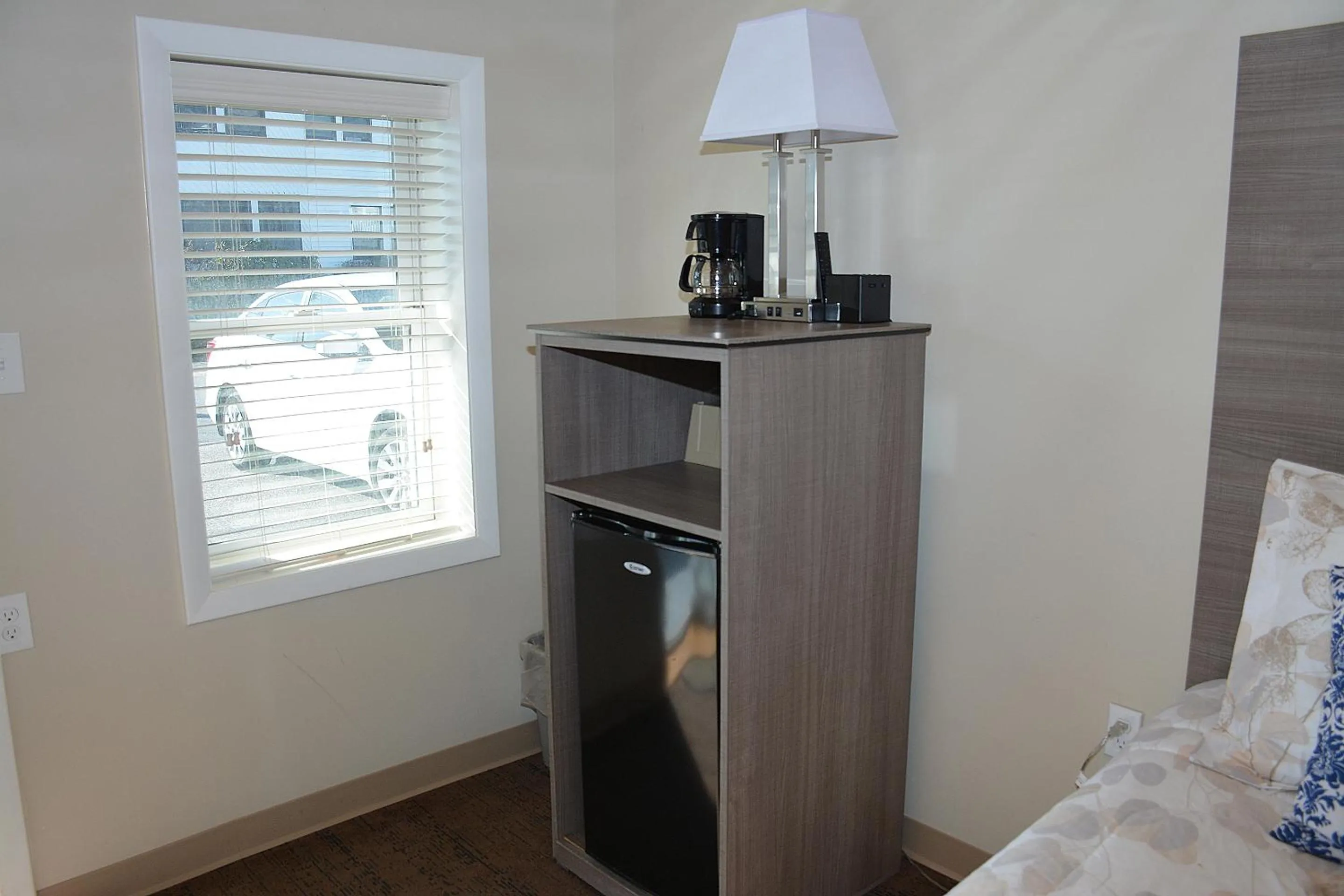 Bed in Alouette Beach Resort Economy Rooms