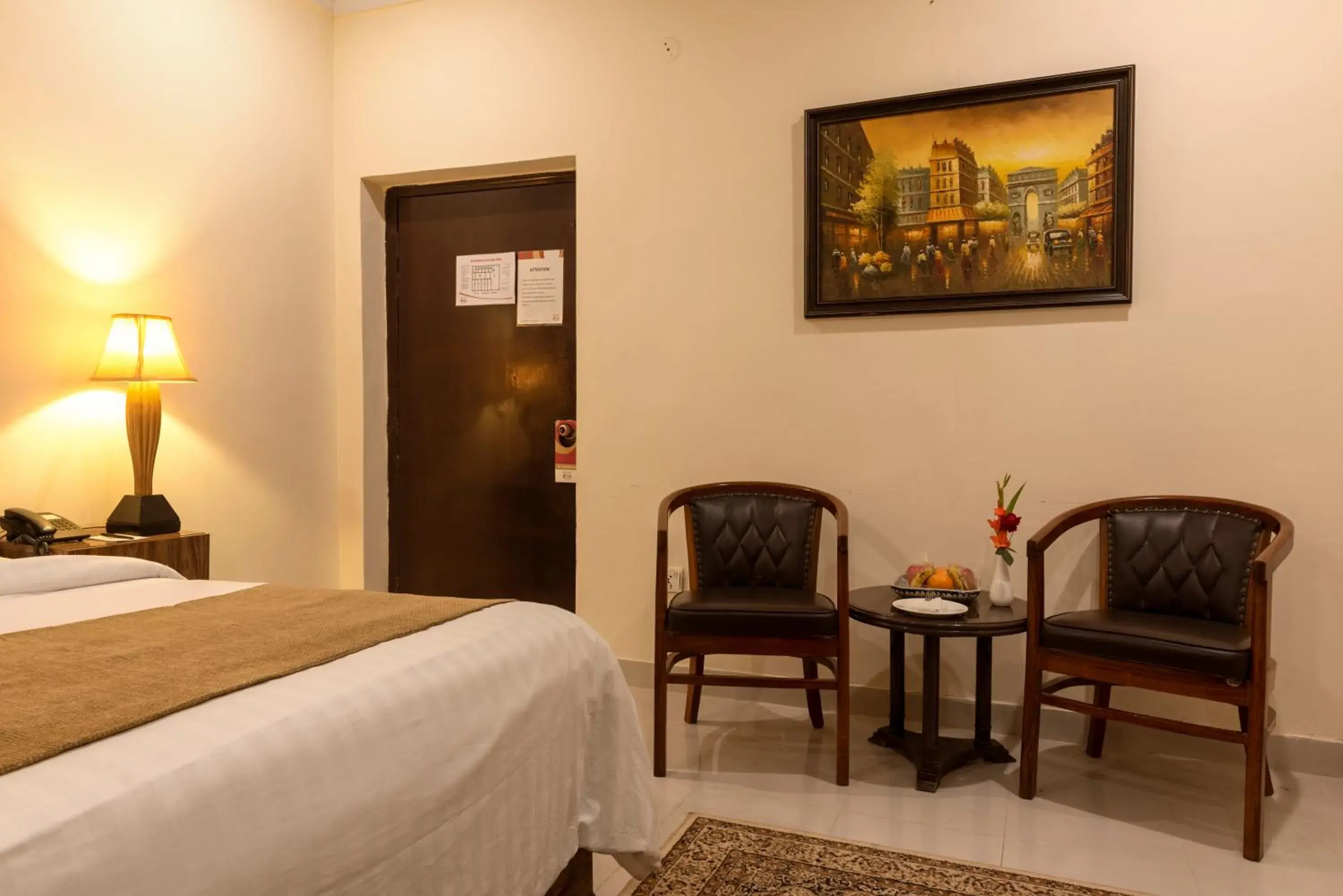 Seating area, Bed in Hotel One Lalazar Multan Seating area, Bed in Hotel One Lalazar Multan