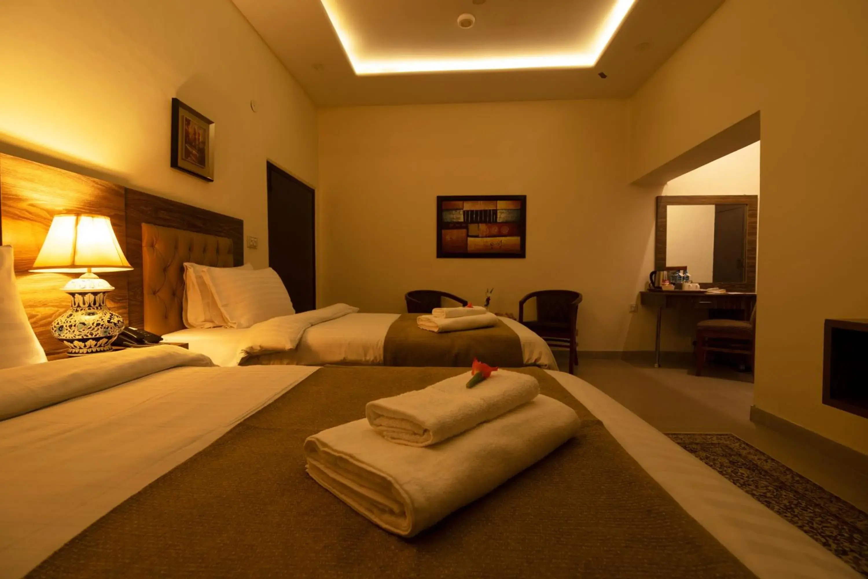 Photo of the whole room, Bed in Hotel One Lalazar Multan Photo of the whole room, Bed in Hotel One Lalazar Multan