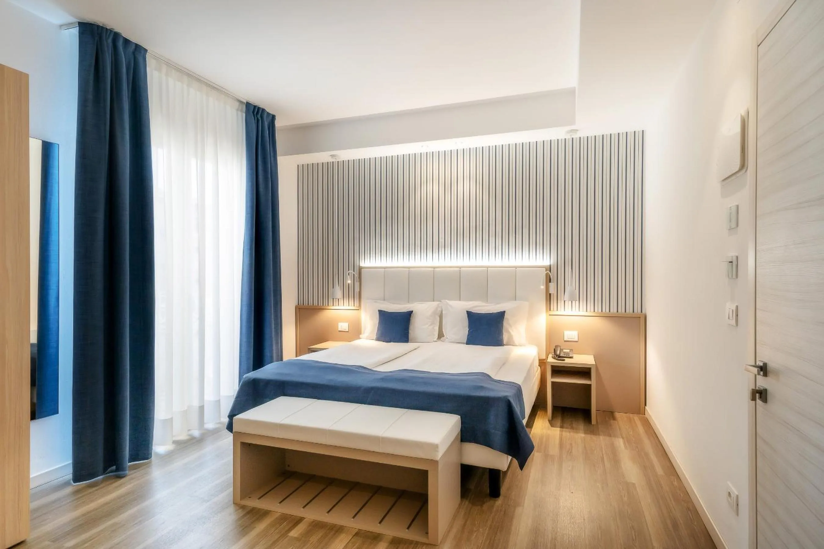 Bed in International Beach Hotel