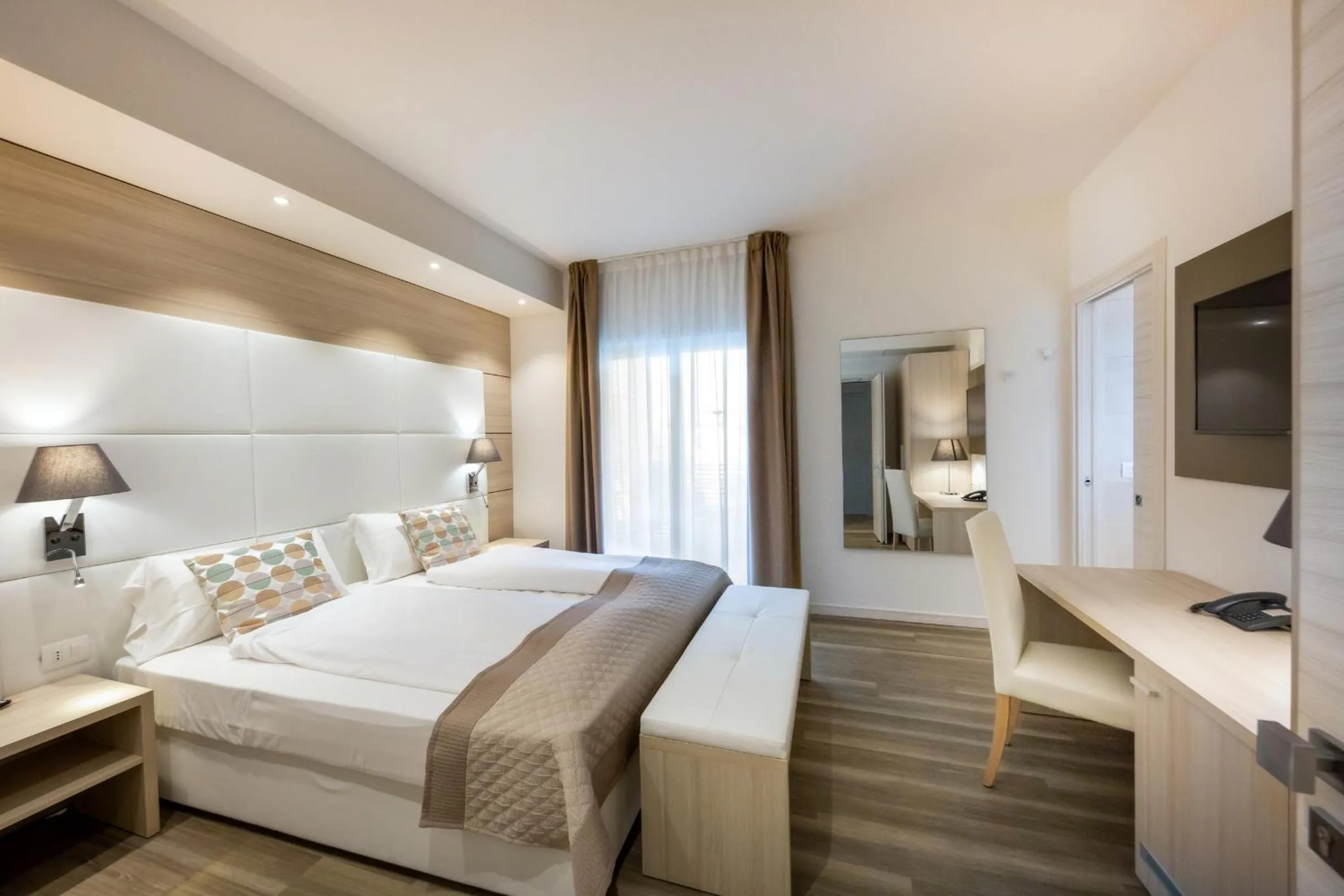 Bedroom, Bed in International Beach Hotel