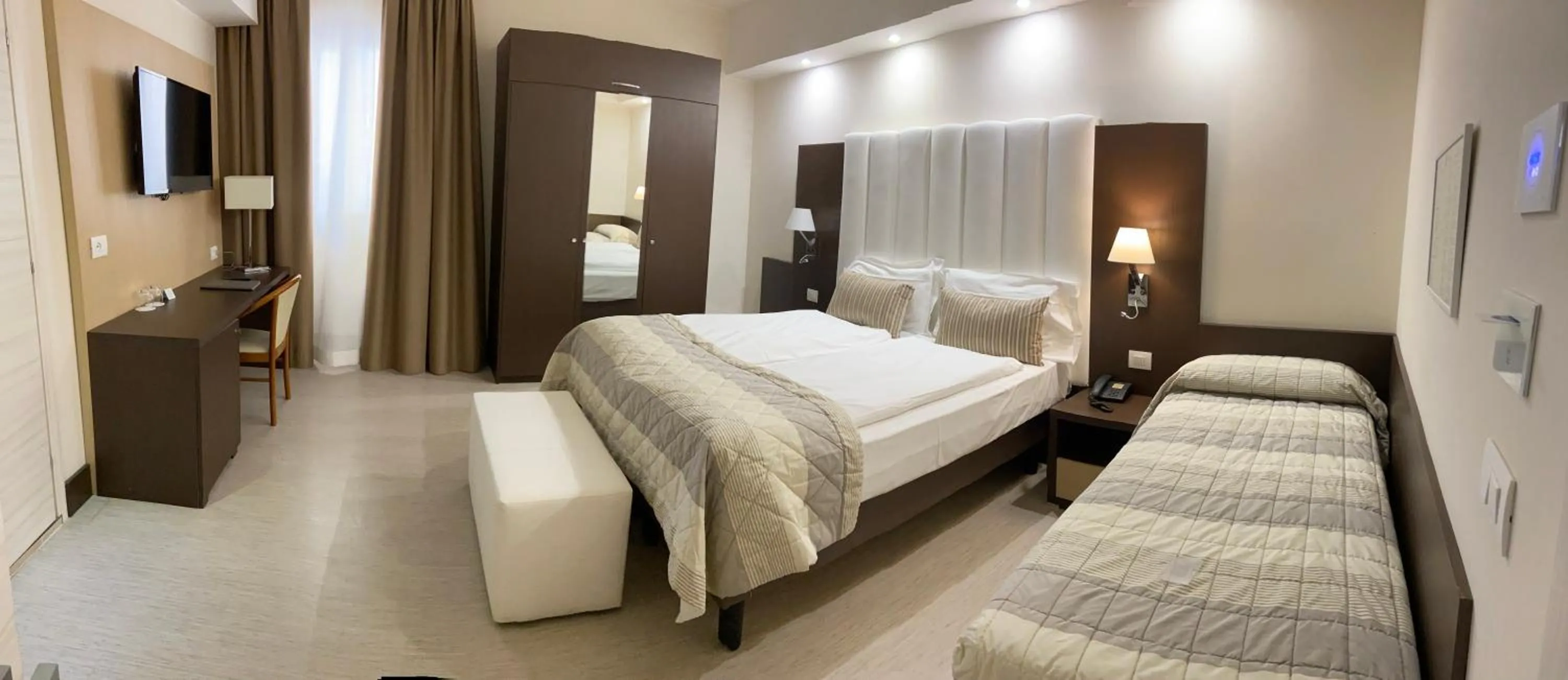 Bed in International Beach Hotel