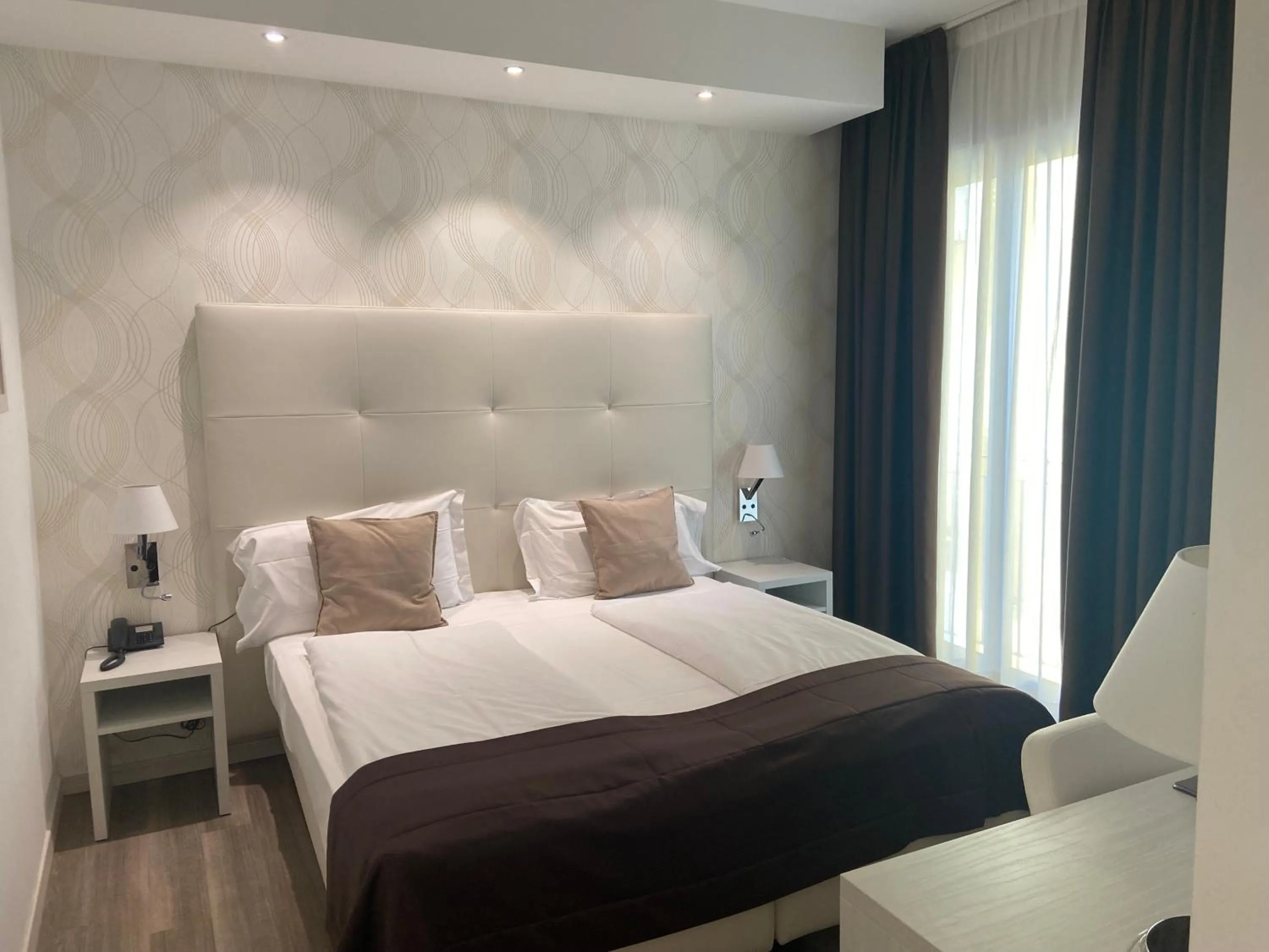 Bed in International Beach Hotel