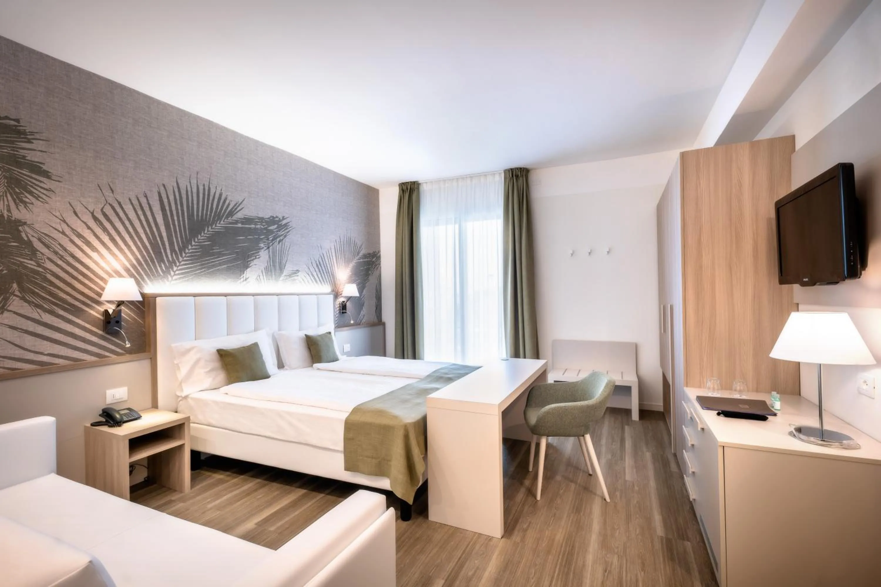 Bed in International Beach Hotel