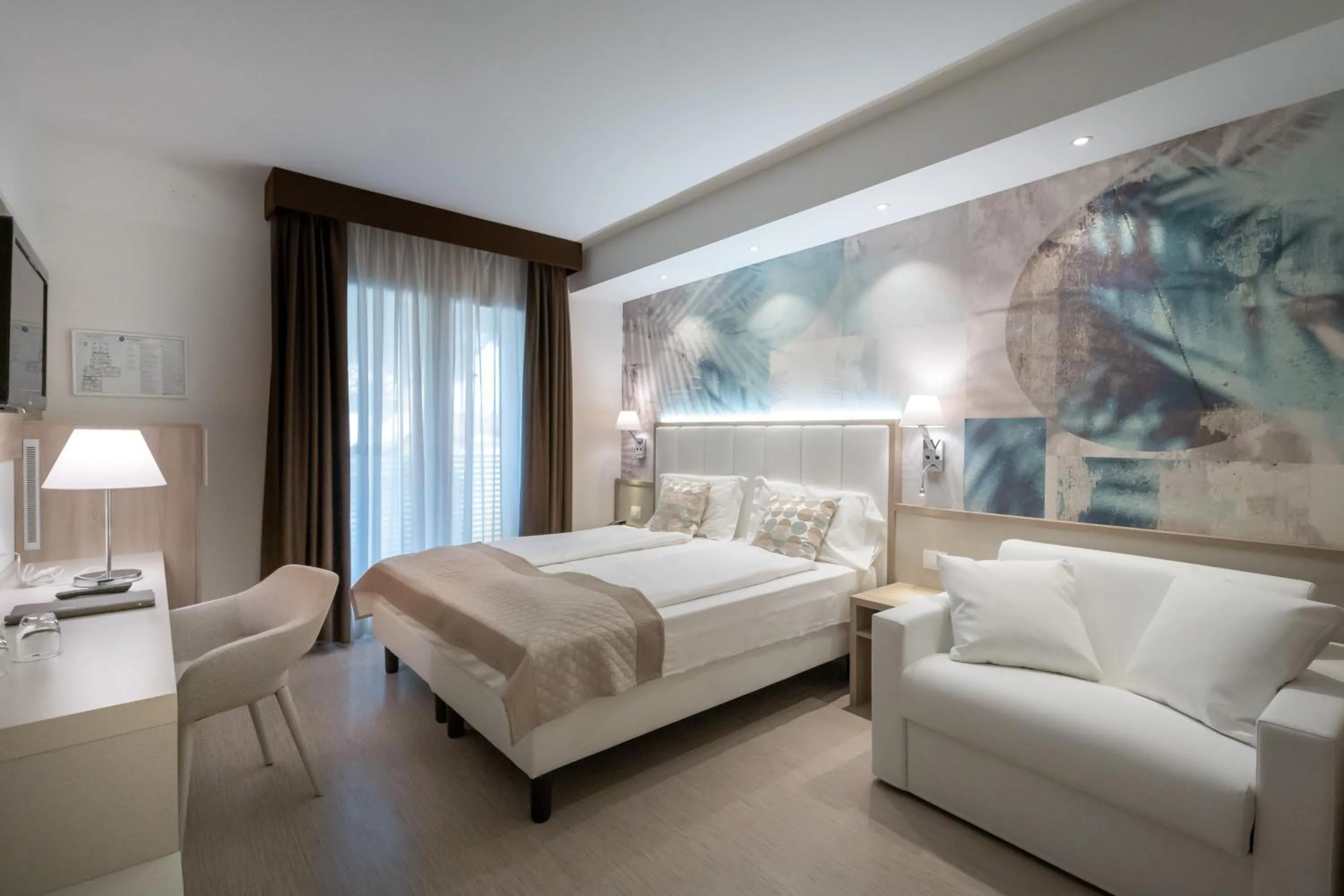 Bed in International Beach Hotel