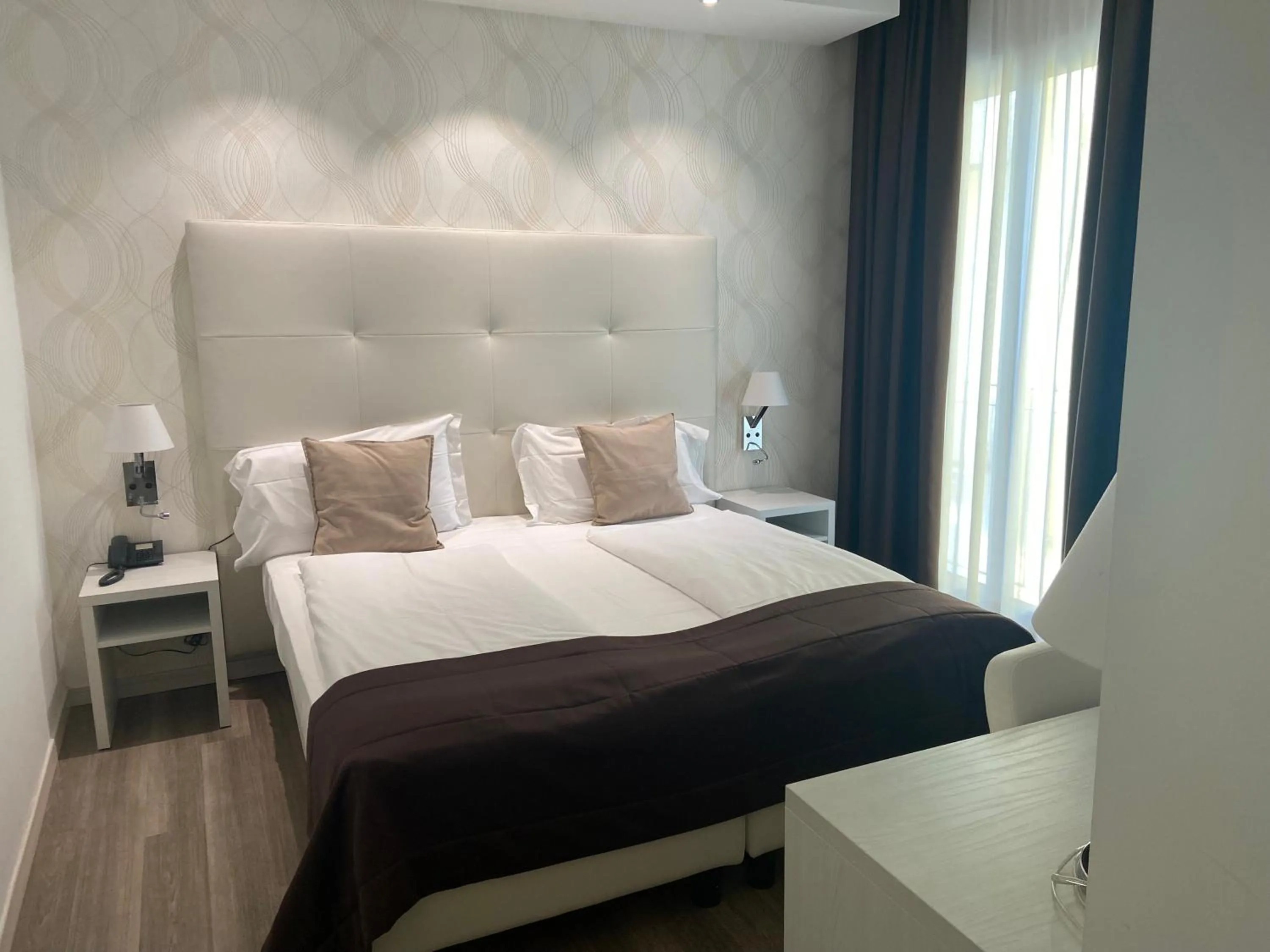 Bed in International Beach Hotel