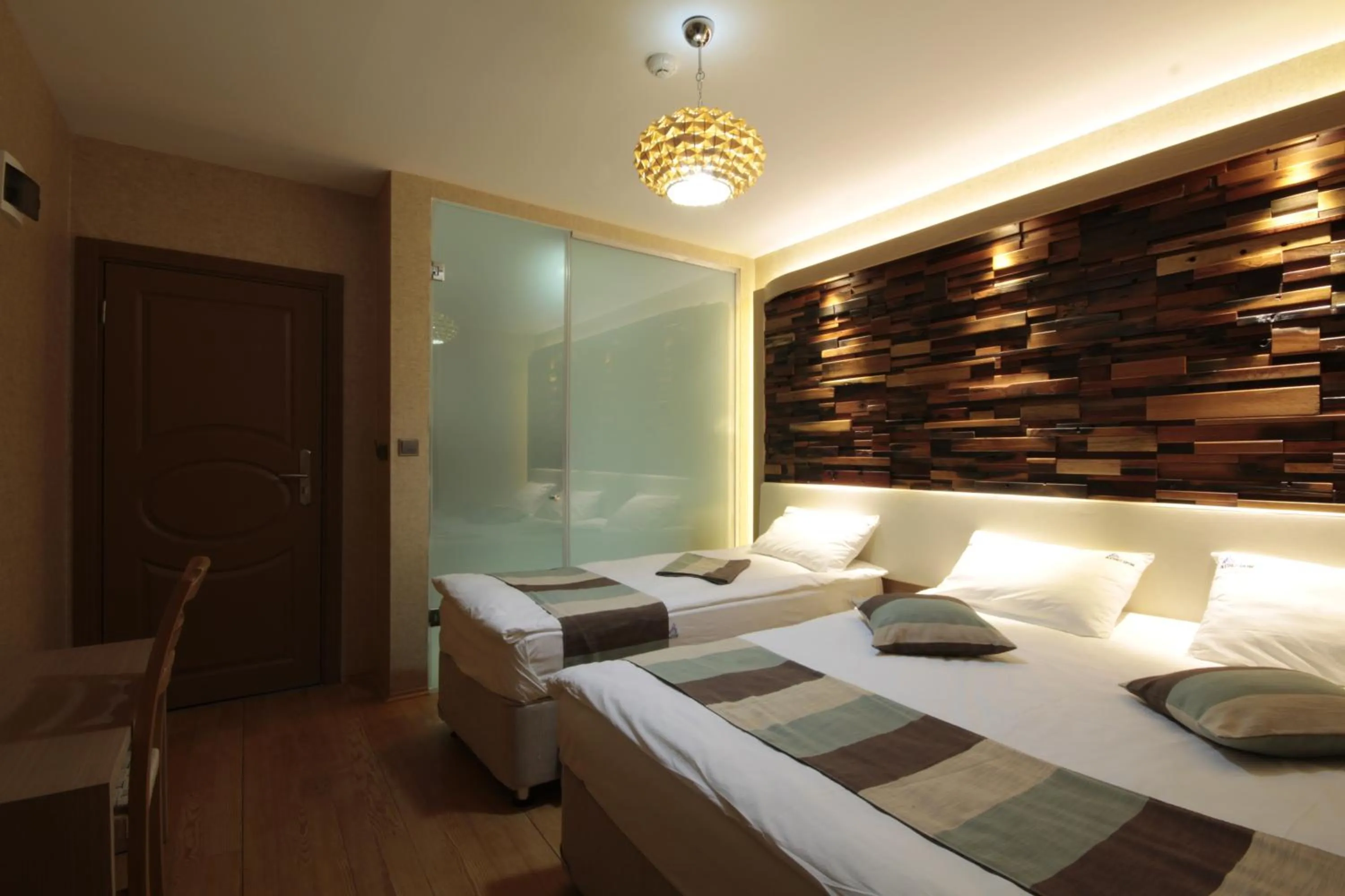 Bed in Ayderoom Hotel