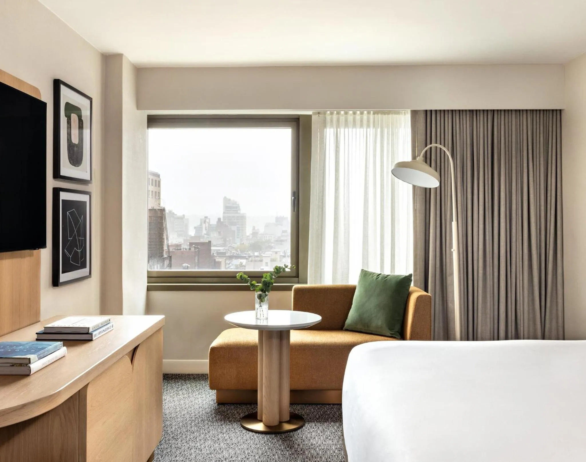 Photo of the whole room, Bed in Kimpton Theta New York - Times Square by IHG