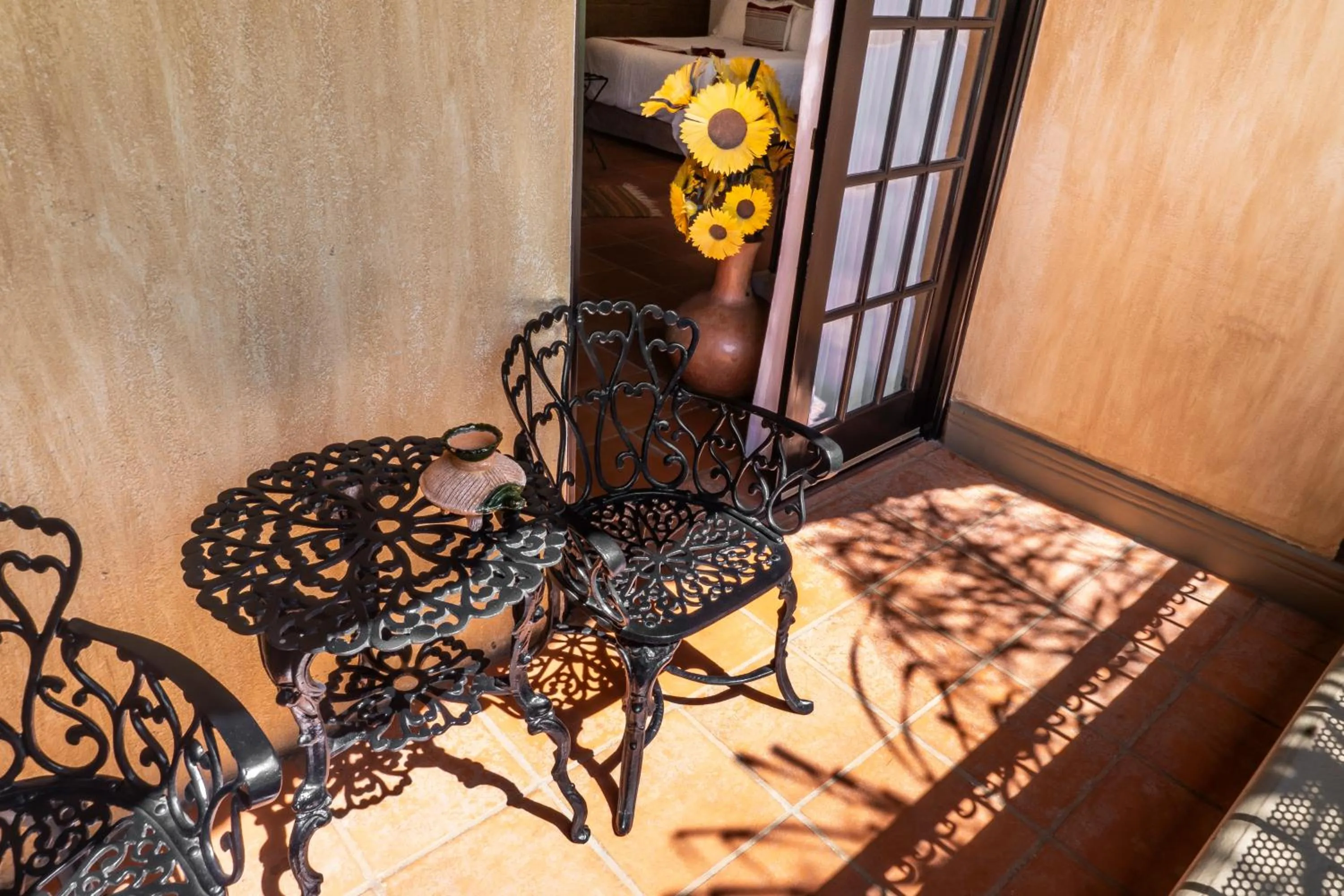 Balcony/Terrace, Bed in Casa de Adobe Gallery & Luxury Boutique