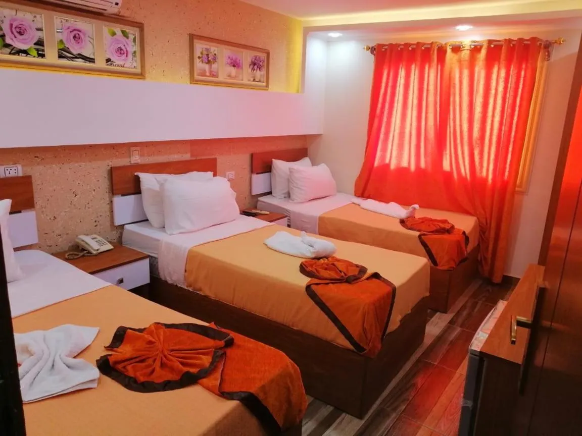 Photo of the whole room, Bed in Osiris Hotel Cairo