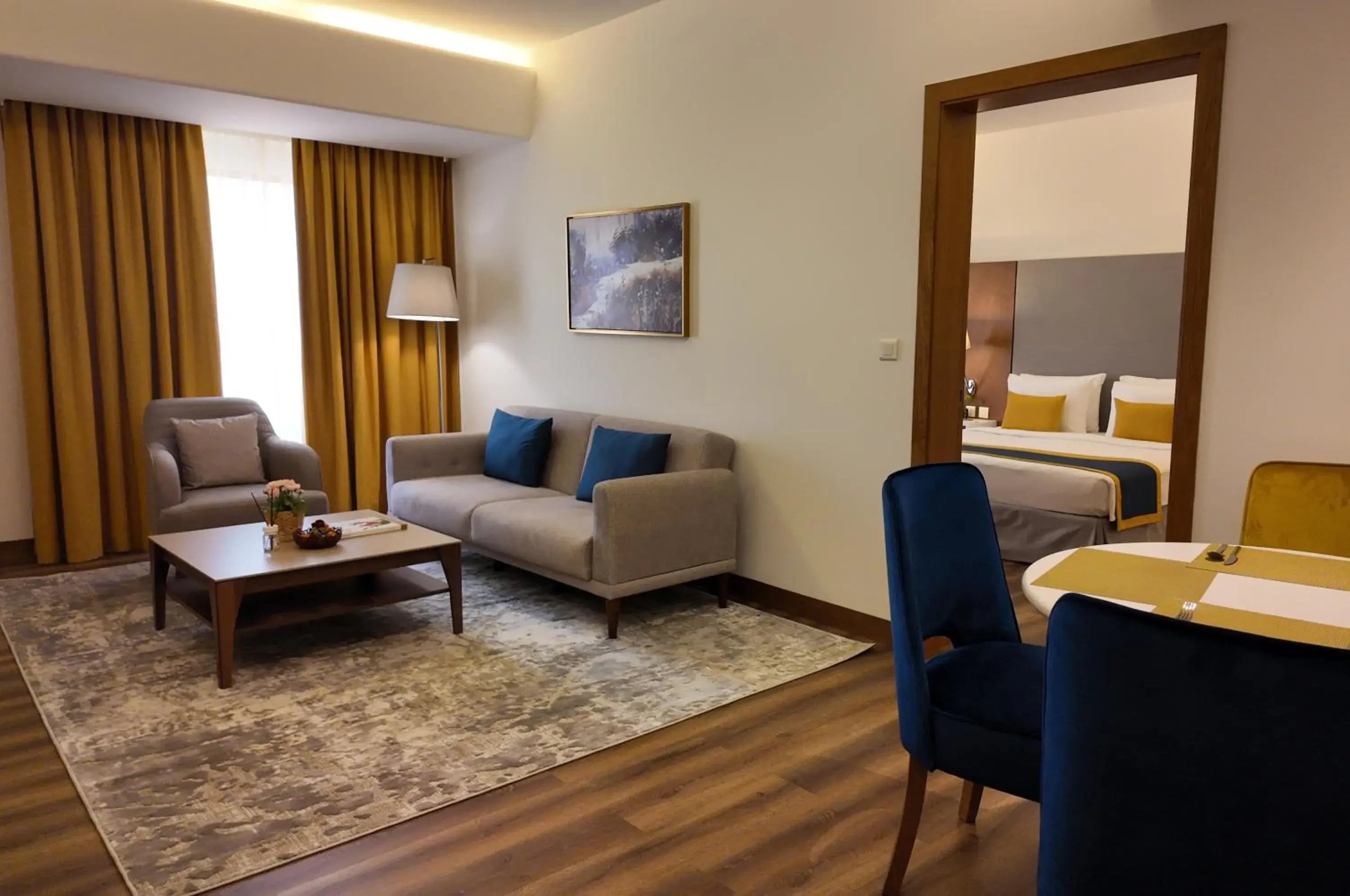 Living room, Bed in Golden Tulip Muscat Living room, Bed in Golden Tulip Muscat