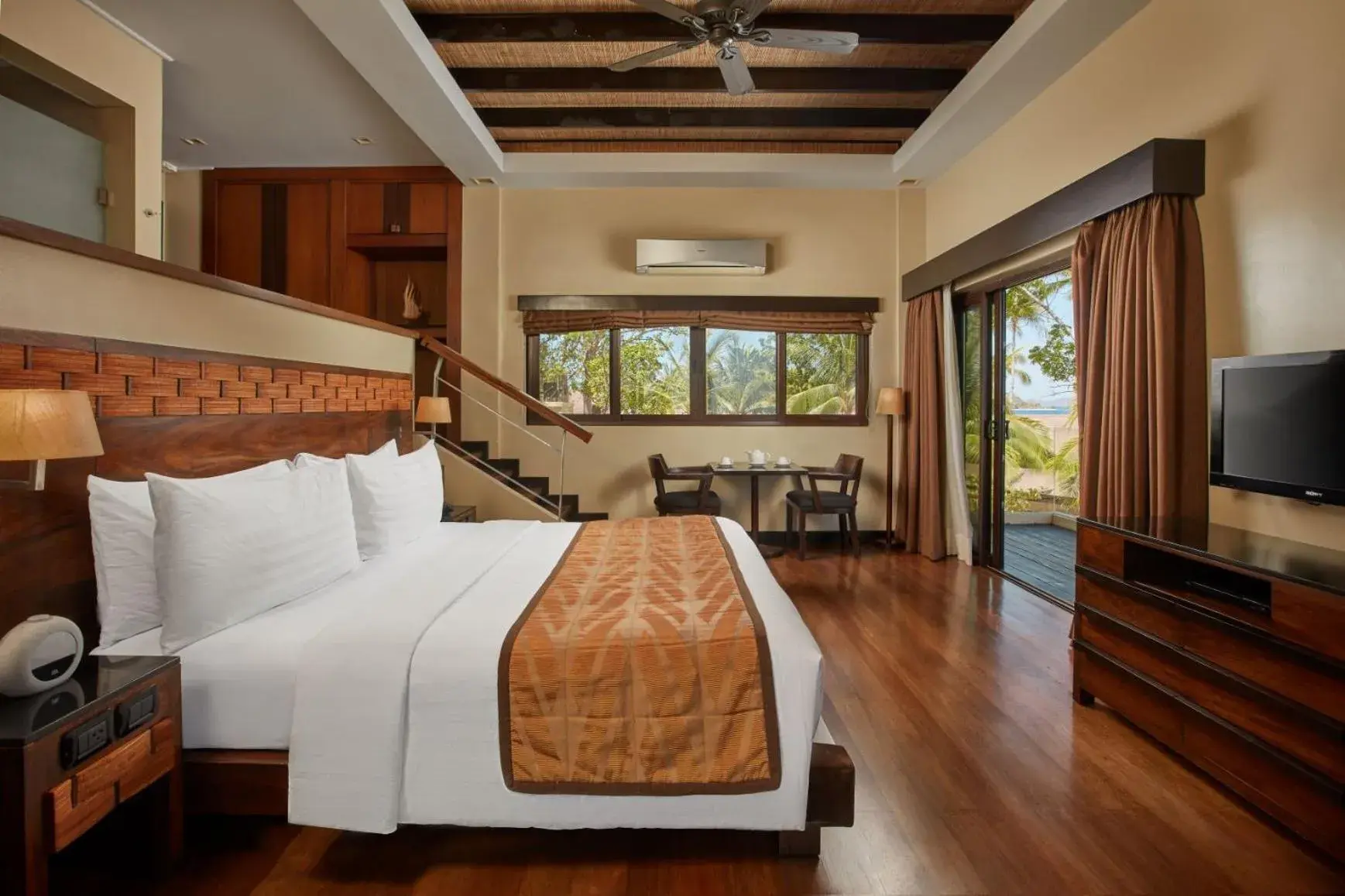 Bed in Two Seasons Coron Island Resort Bed in Two Seasons Coron Island Resort