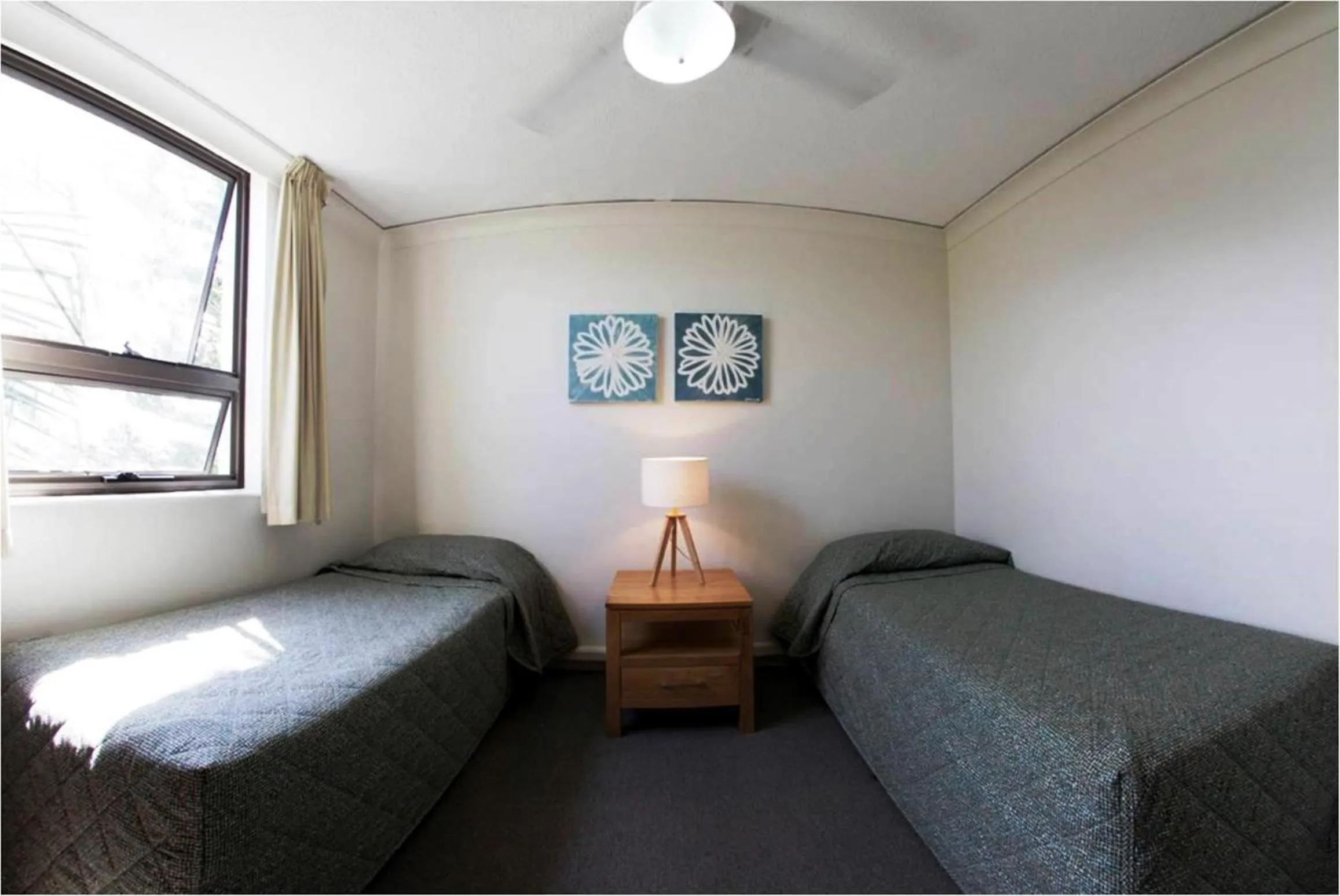 Bed in Headland Tropicana Resort